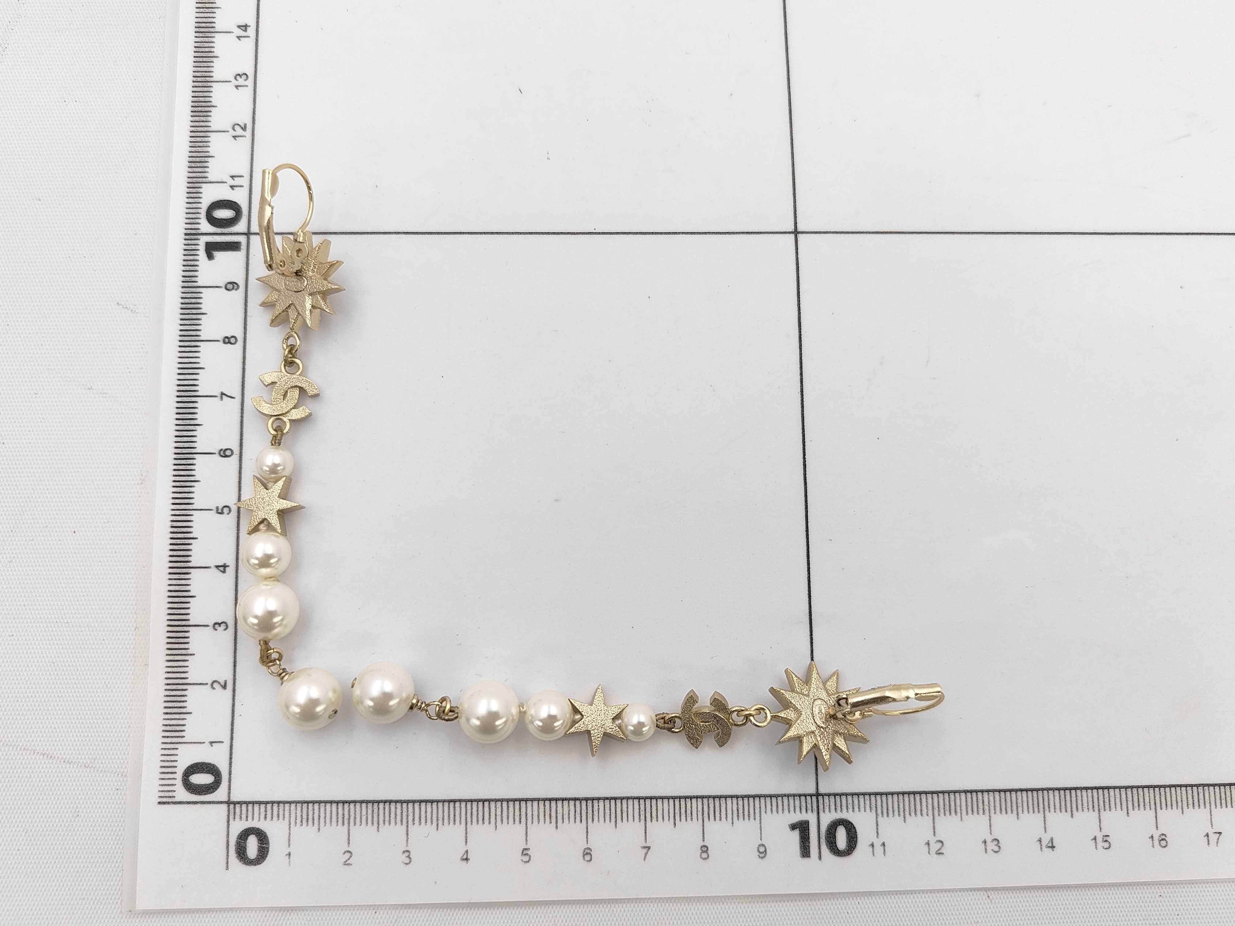 D17 Coco Mark Star Pearl Chain Earrings (Gold Earrings) — view 6