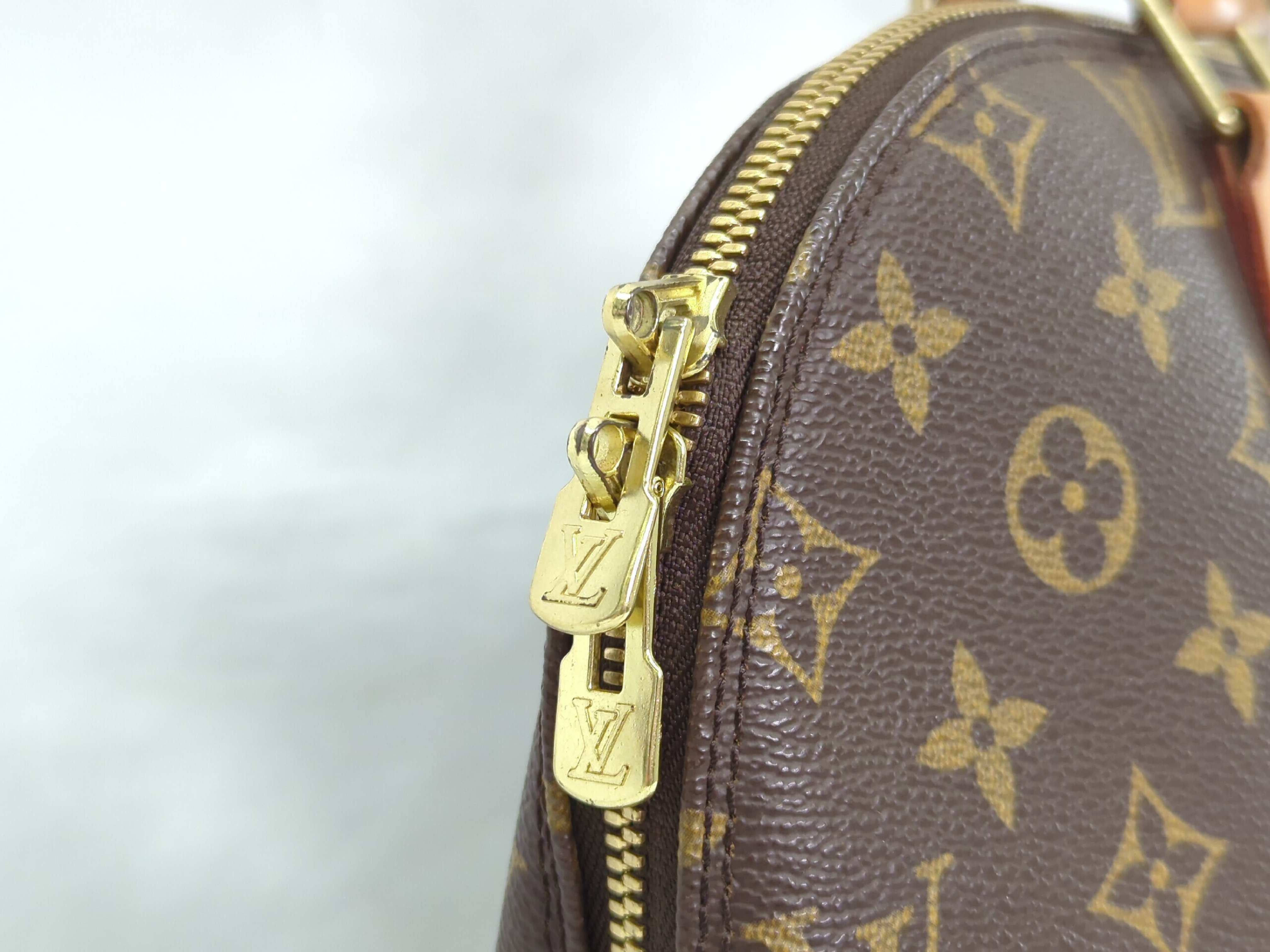 M51130 Monogram Alma PM Handbag — view 9