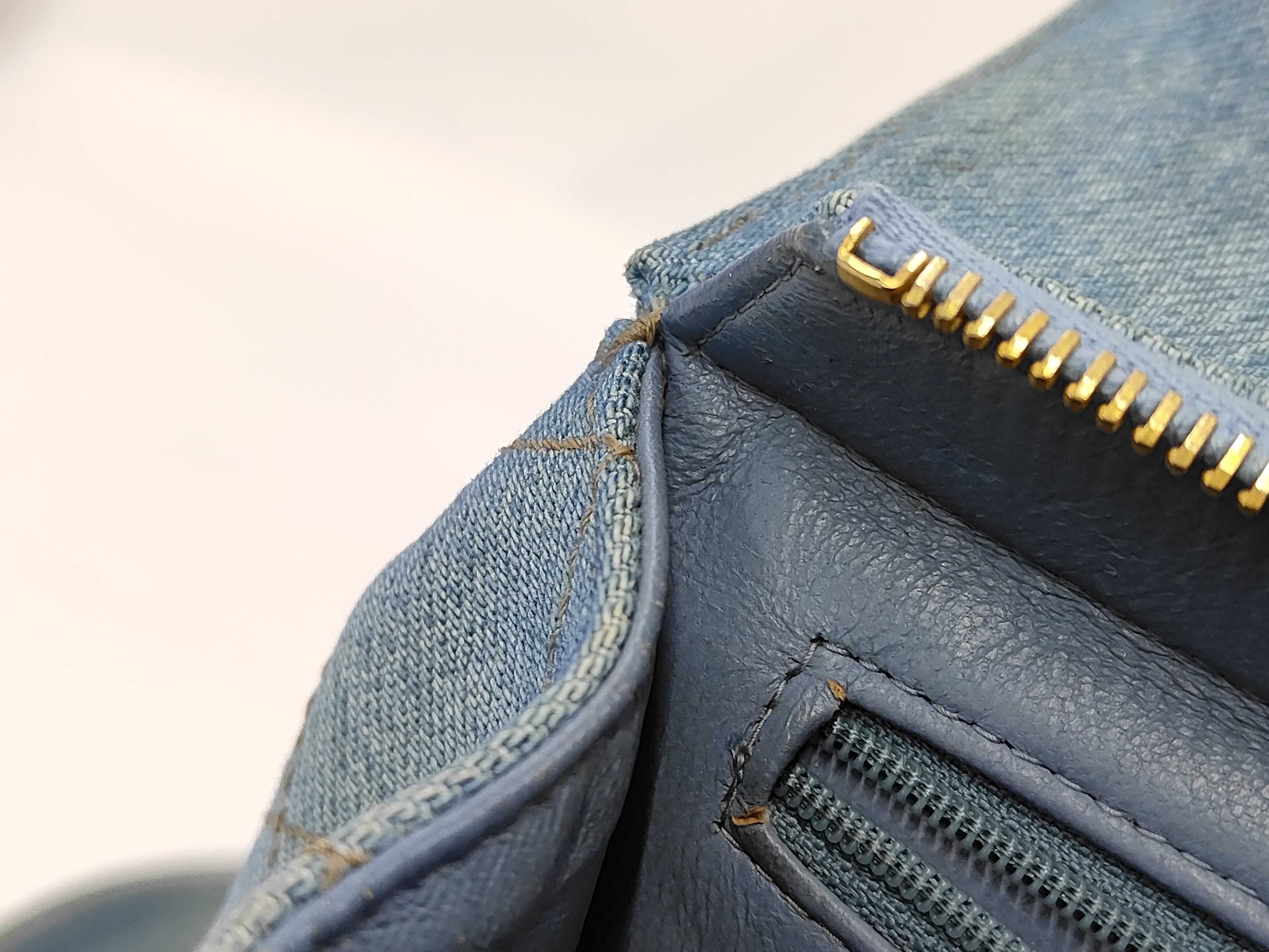 denim backpack with gold hardware and chain strap (model number 4) — view 11