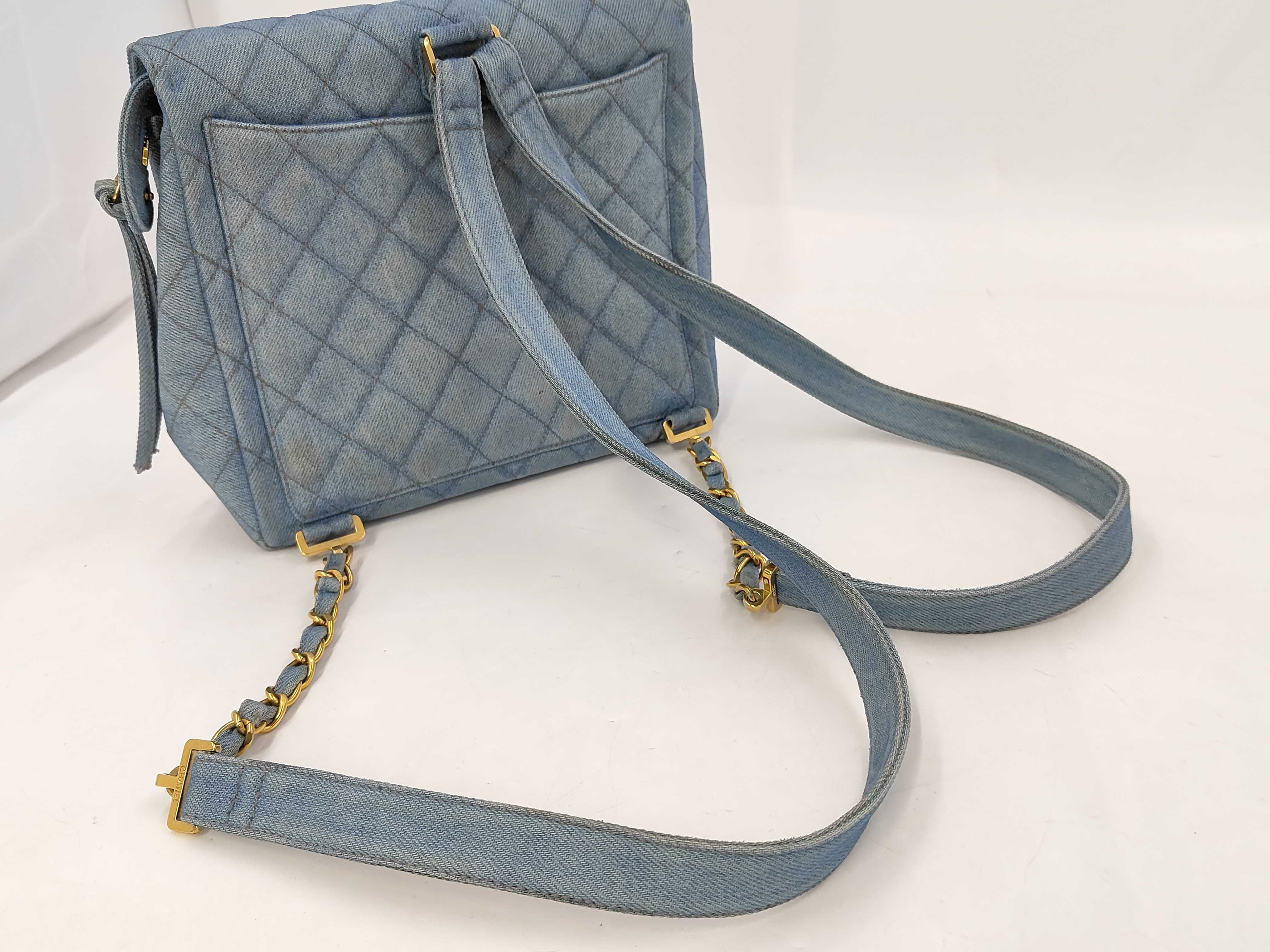 denim backpack with gold hardware and chain strap (model number 4) — view 3