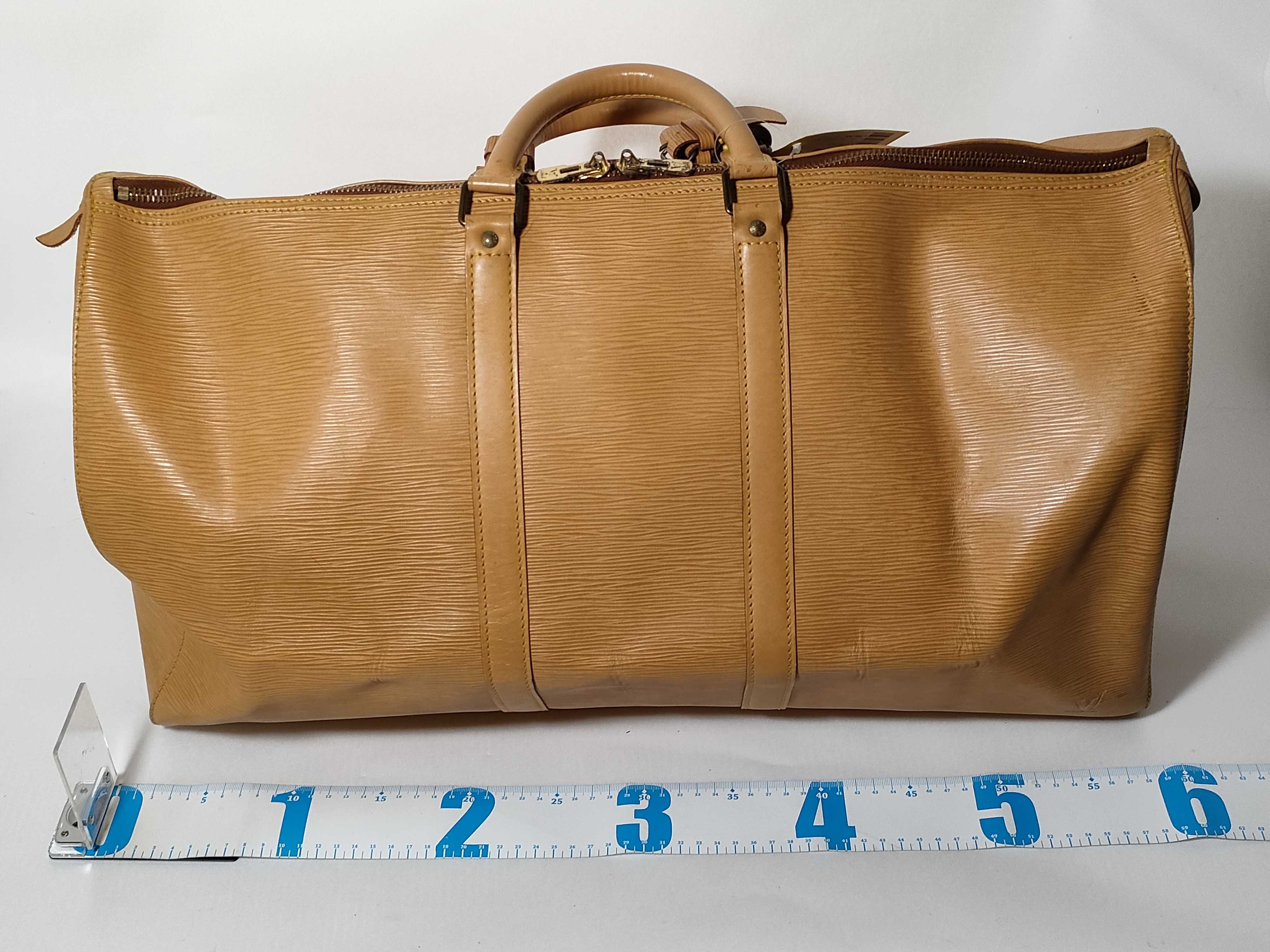 Epi Keepall Boston Bag, Yellow, with some mold inside and corner wear. — view 2