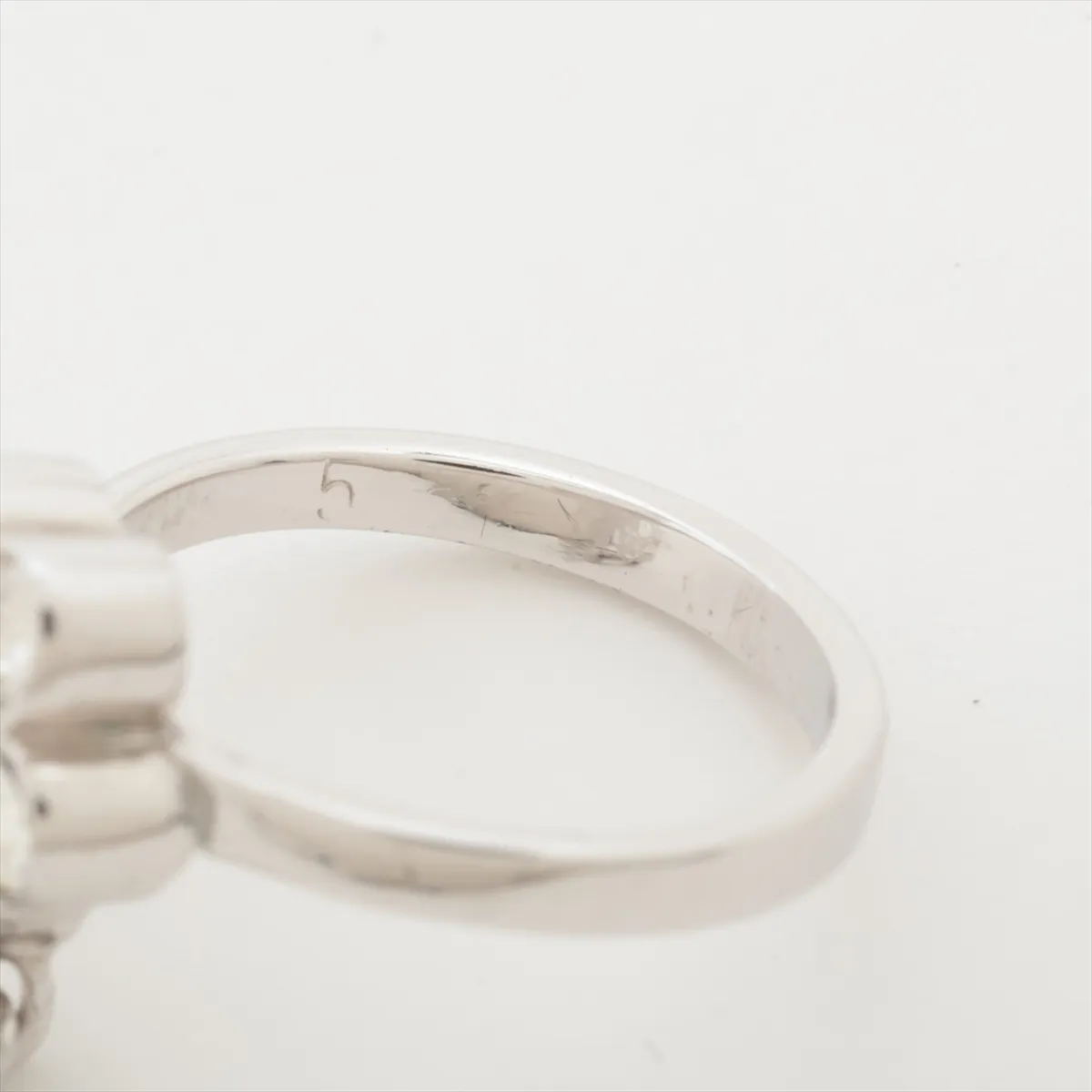 D-logo ring, metal with rhinestones, silver. Shows dents, — view 3
