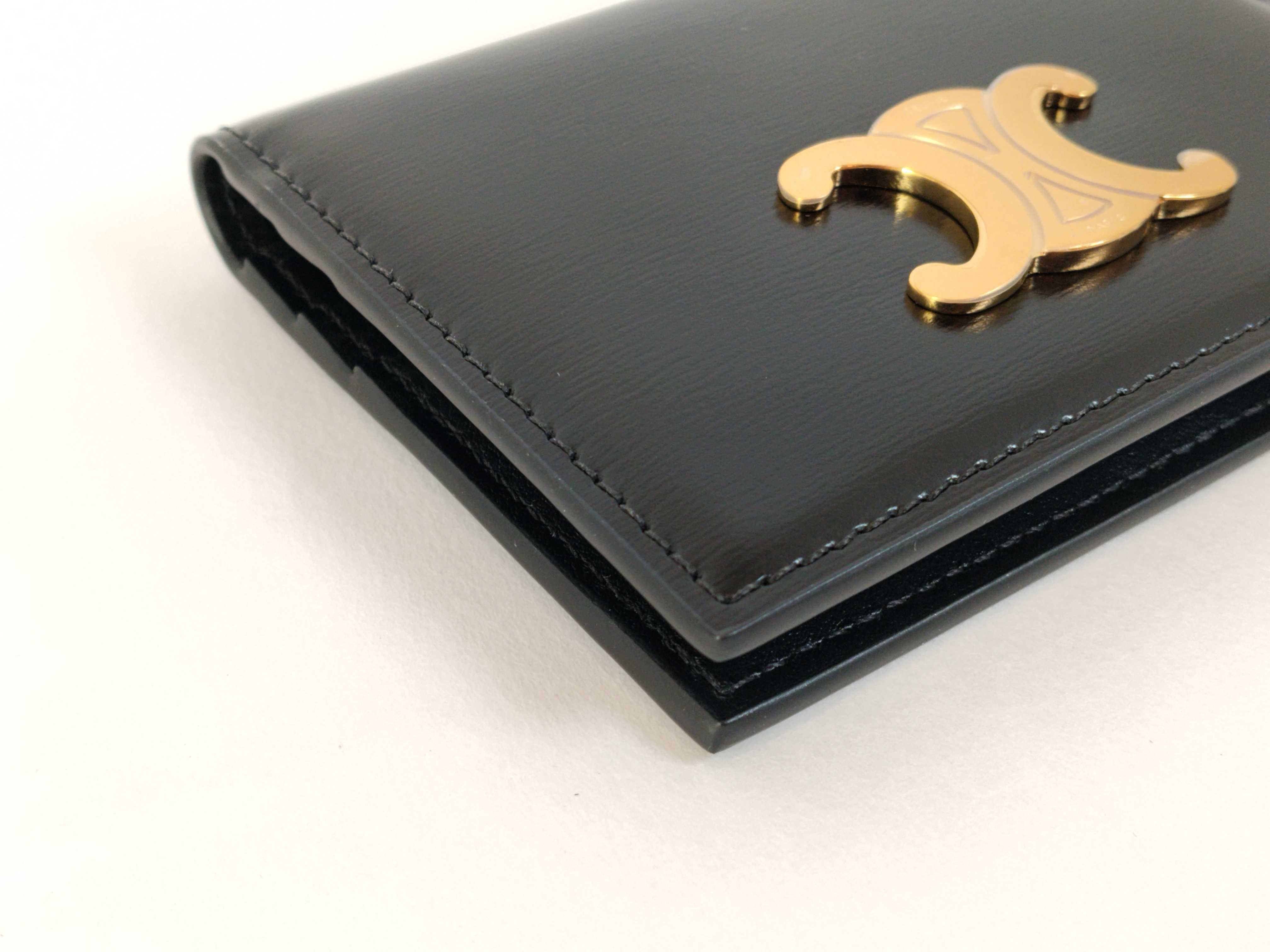 Bifold Triomphe Card Holder, Black/Gold, with protective film on hardware. Card case, pass case, business card holder. — view 3