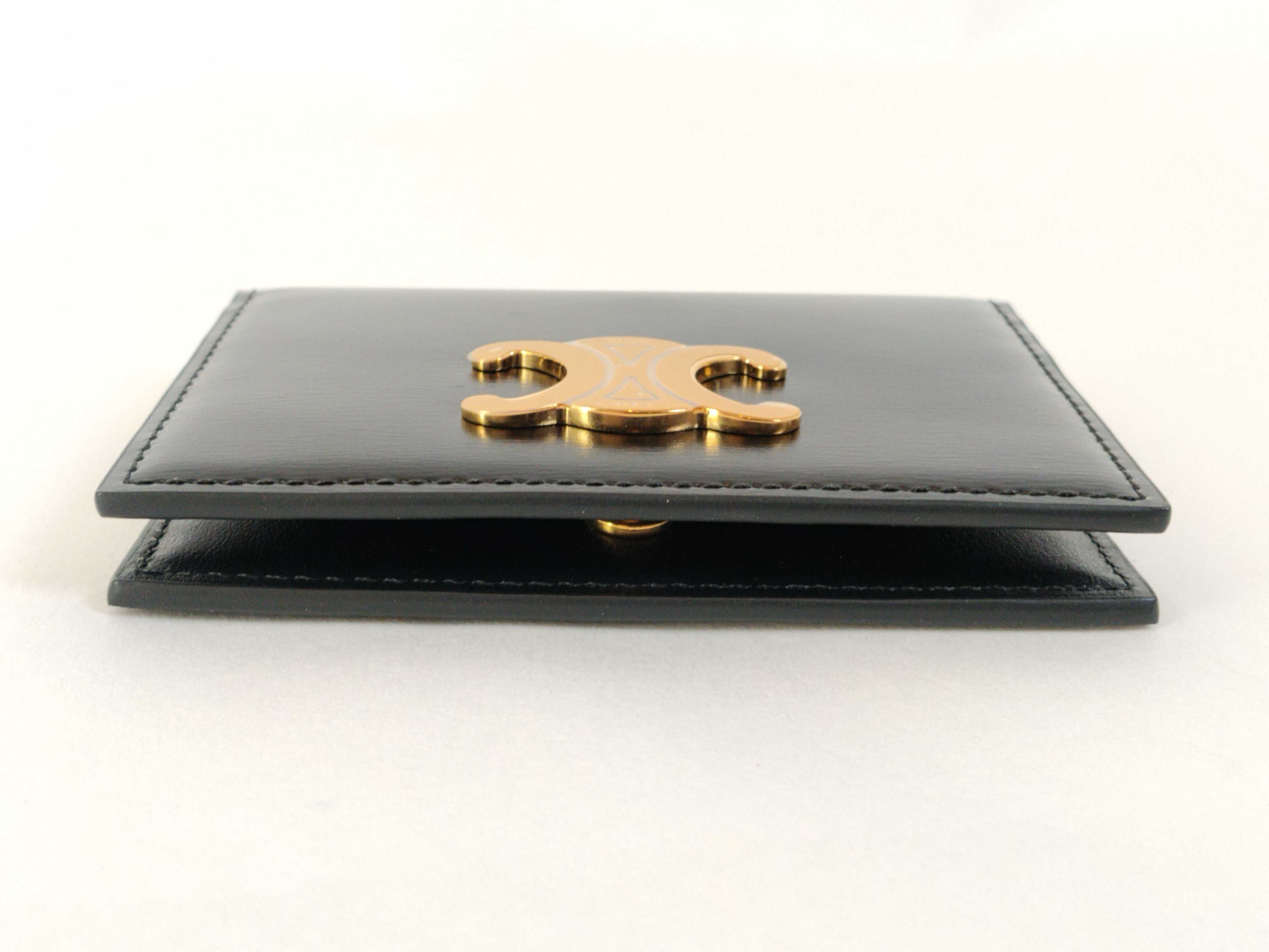 Bifold Triomphe Card Holder, Black/Gold, with protective film on hardware. Card case, pass case, business card holder. — view 4