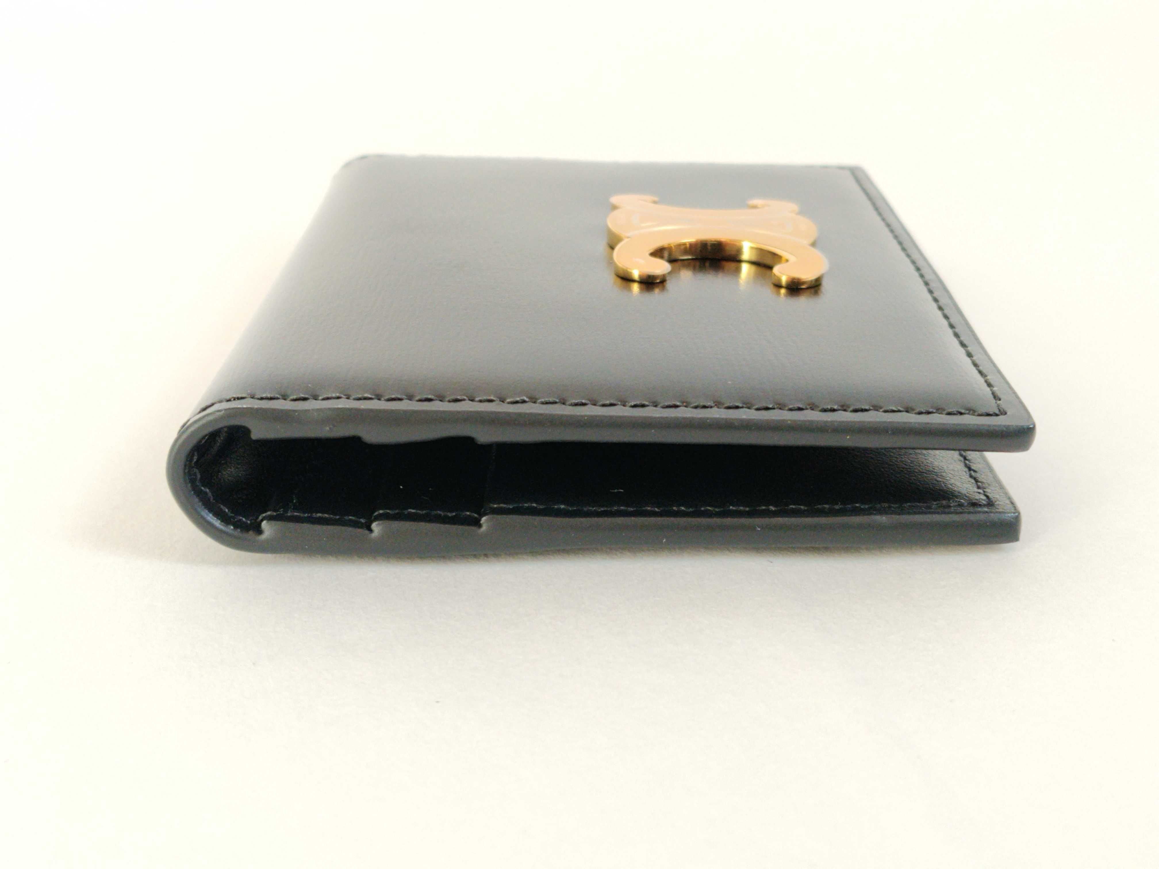 Bifold Triomphe Card Holder, Black/Gold, with protective film on hardware. Card case, pass case, business card holder. — view 7