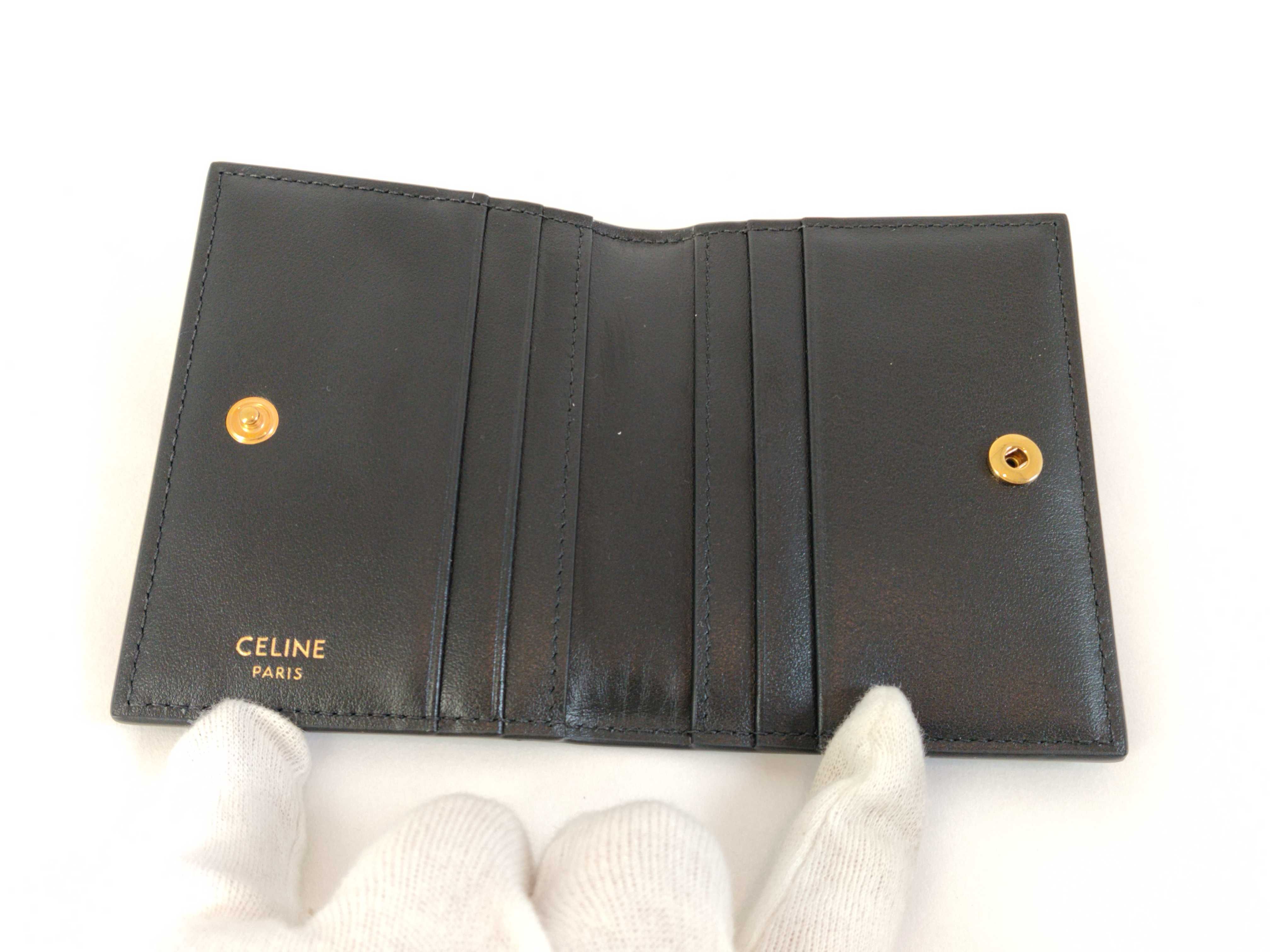 Bifold Triomphe Card Holder, Black/Gold, with protective film on hardware. Card case, pass case, business card holder. — view 8
