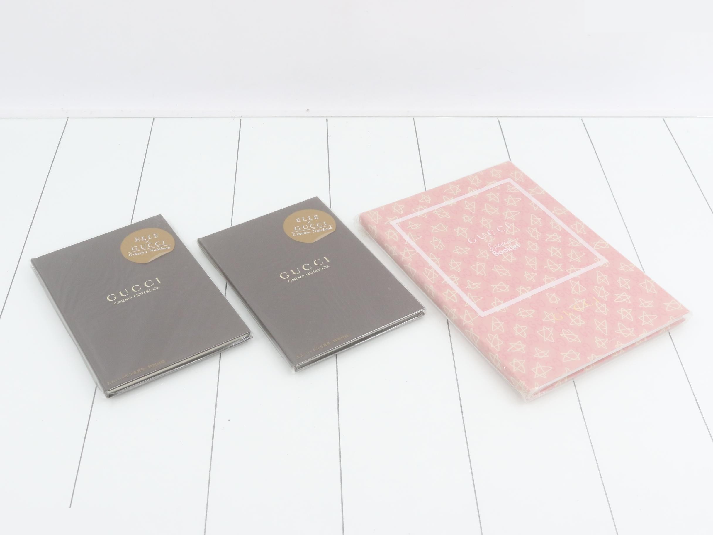 Unused Gucci novelty notebooks, set of 3.