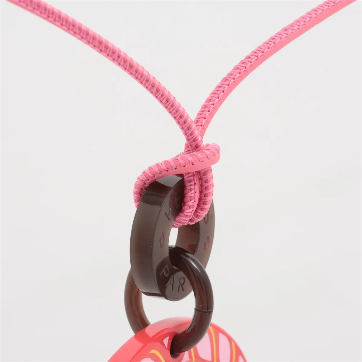H Equipe pendant, buffalo horn x lacquered wood, red, some wear, tarnishing, strap stretched. — view 3