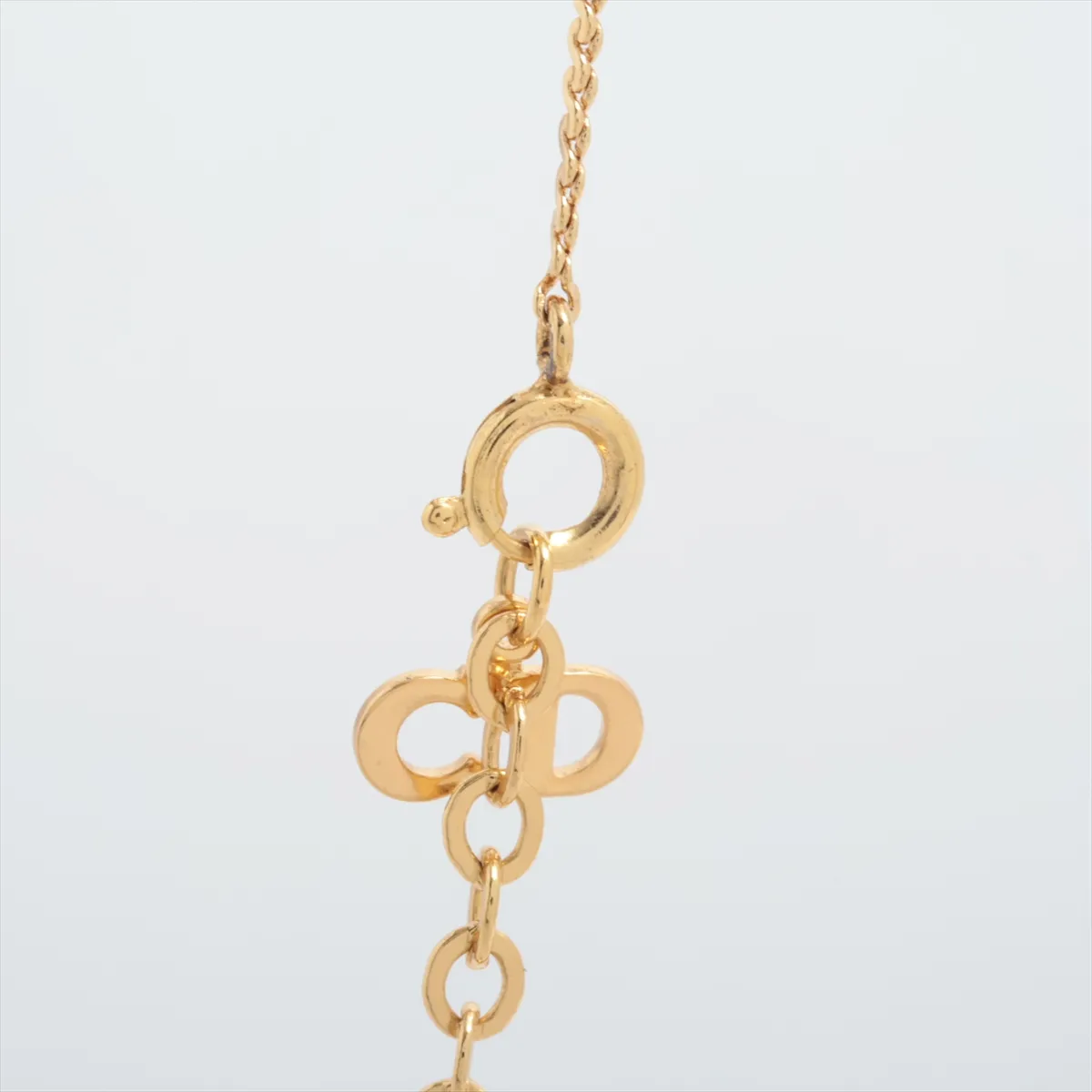 CD logo necklace, gold plated with rhinestones. Shows signs of wear, — view 4