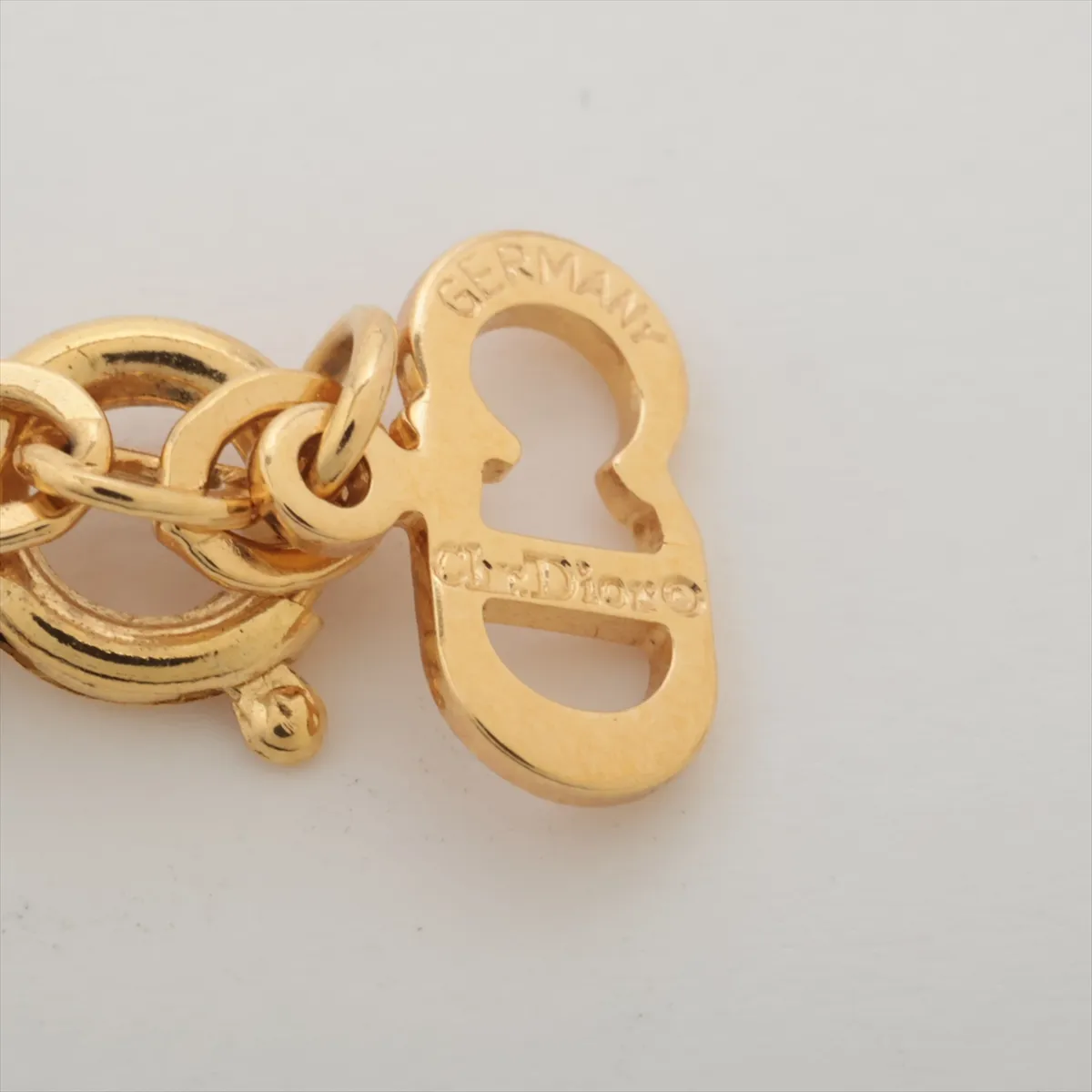 CD logo necklace, gold plated with rhinestones. Shows signs of wear, — view 5