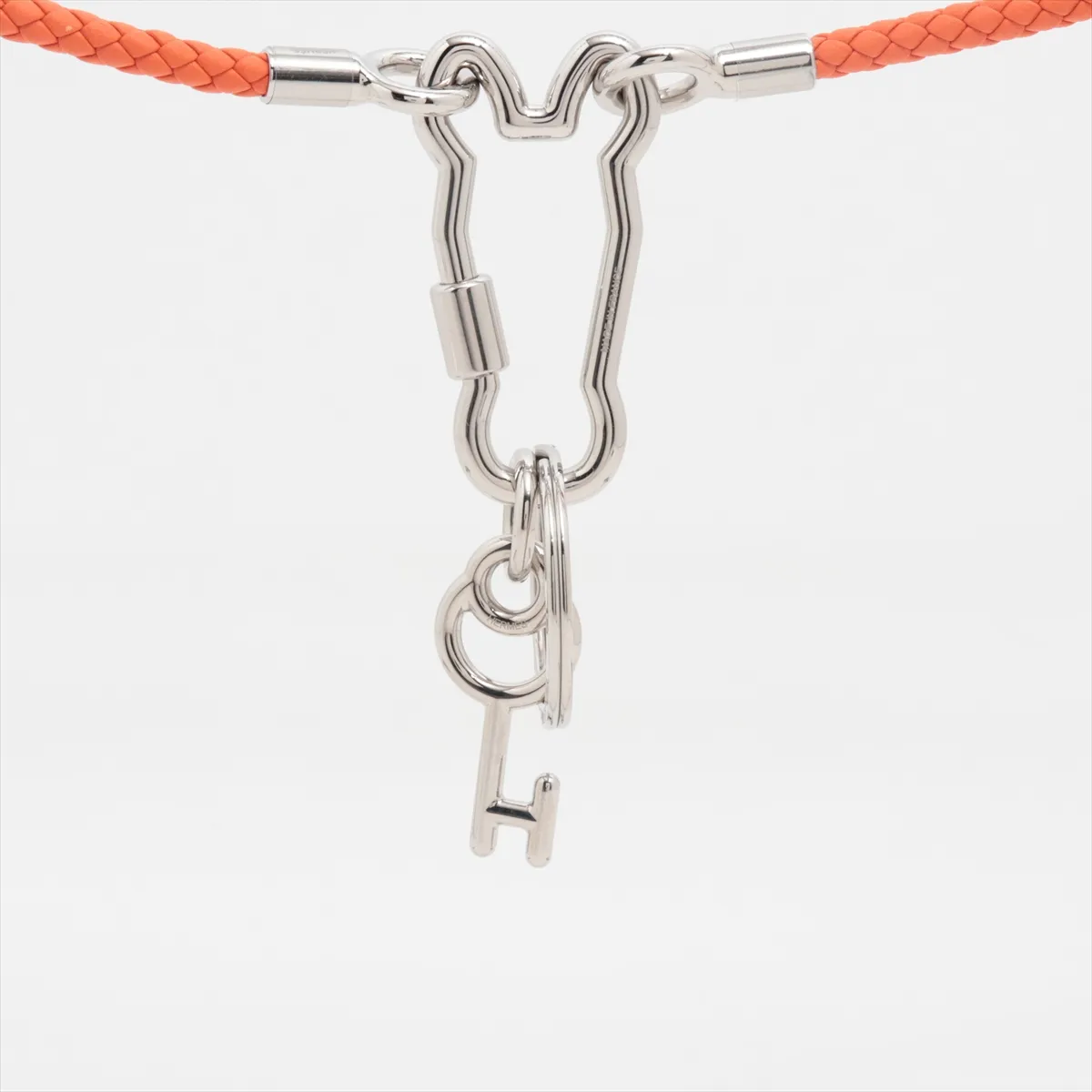 Clé Cheval Muscton Necklace, GP x Leather, Orange x Silver. Shows — view 2