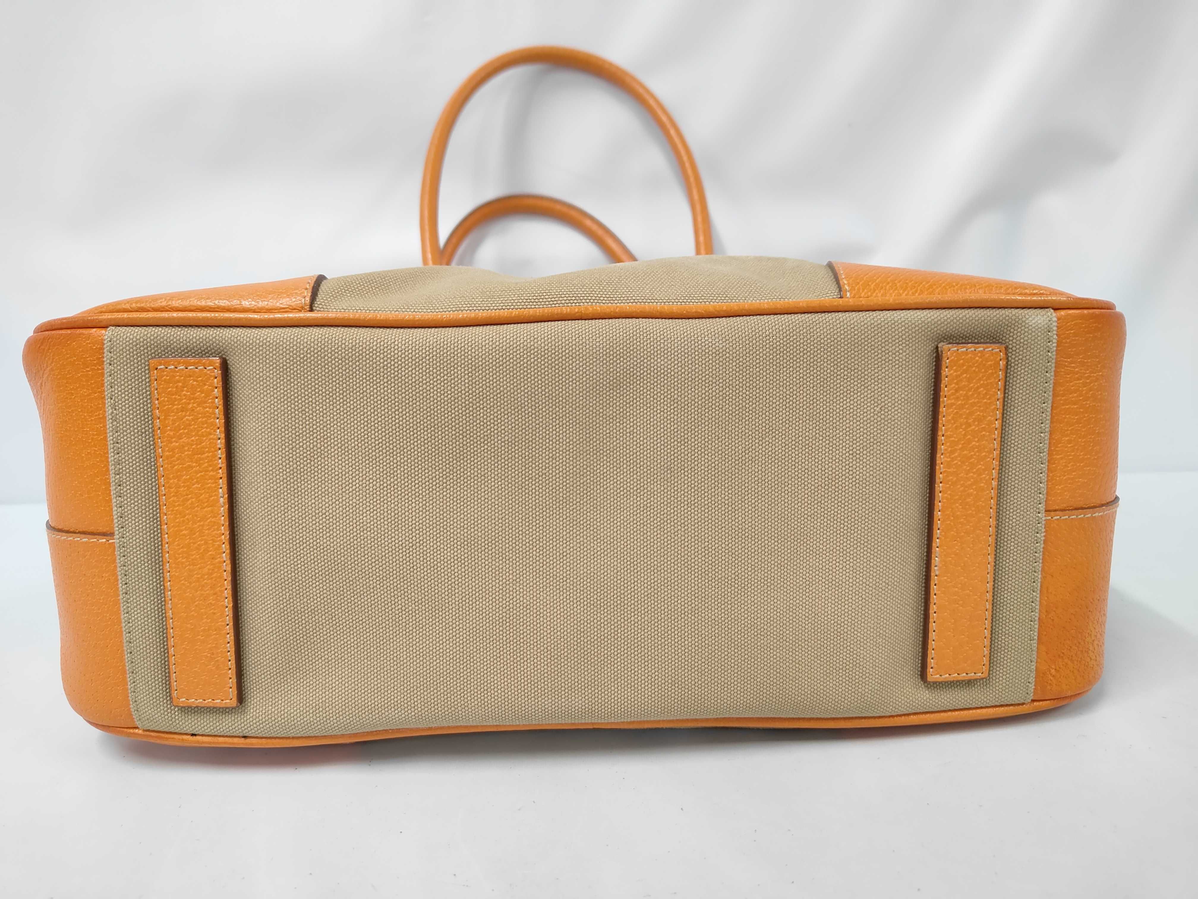 handbag, includes guarantee card, padlock, keys, and name tag. Tote bag. — view 3