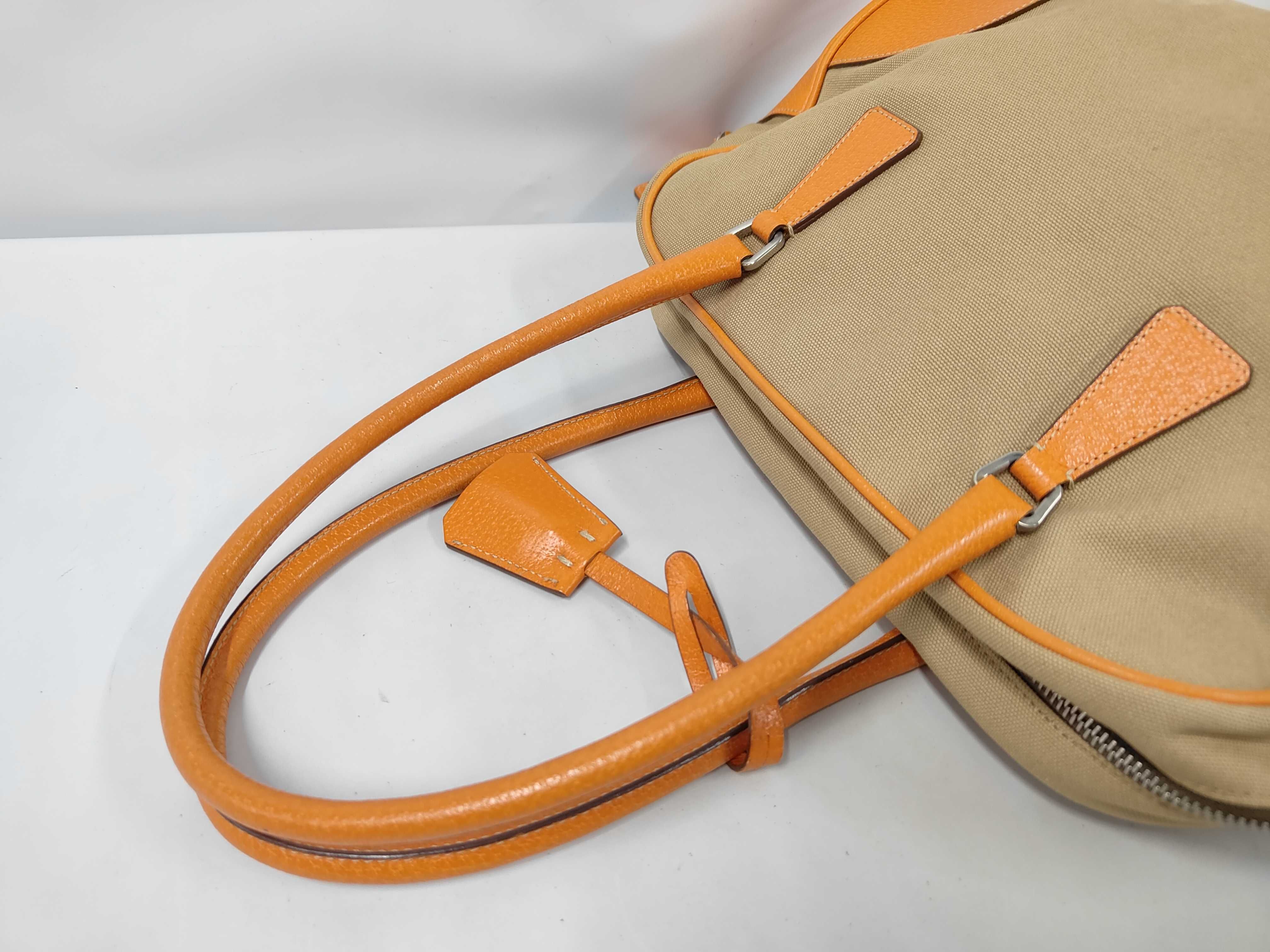 handbag, includes guarantee card, padlock, keys, and name tag. Tote bag. — view 5