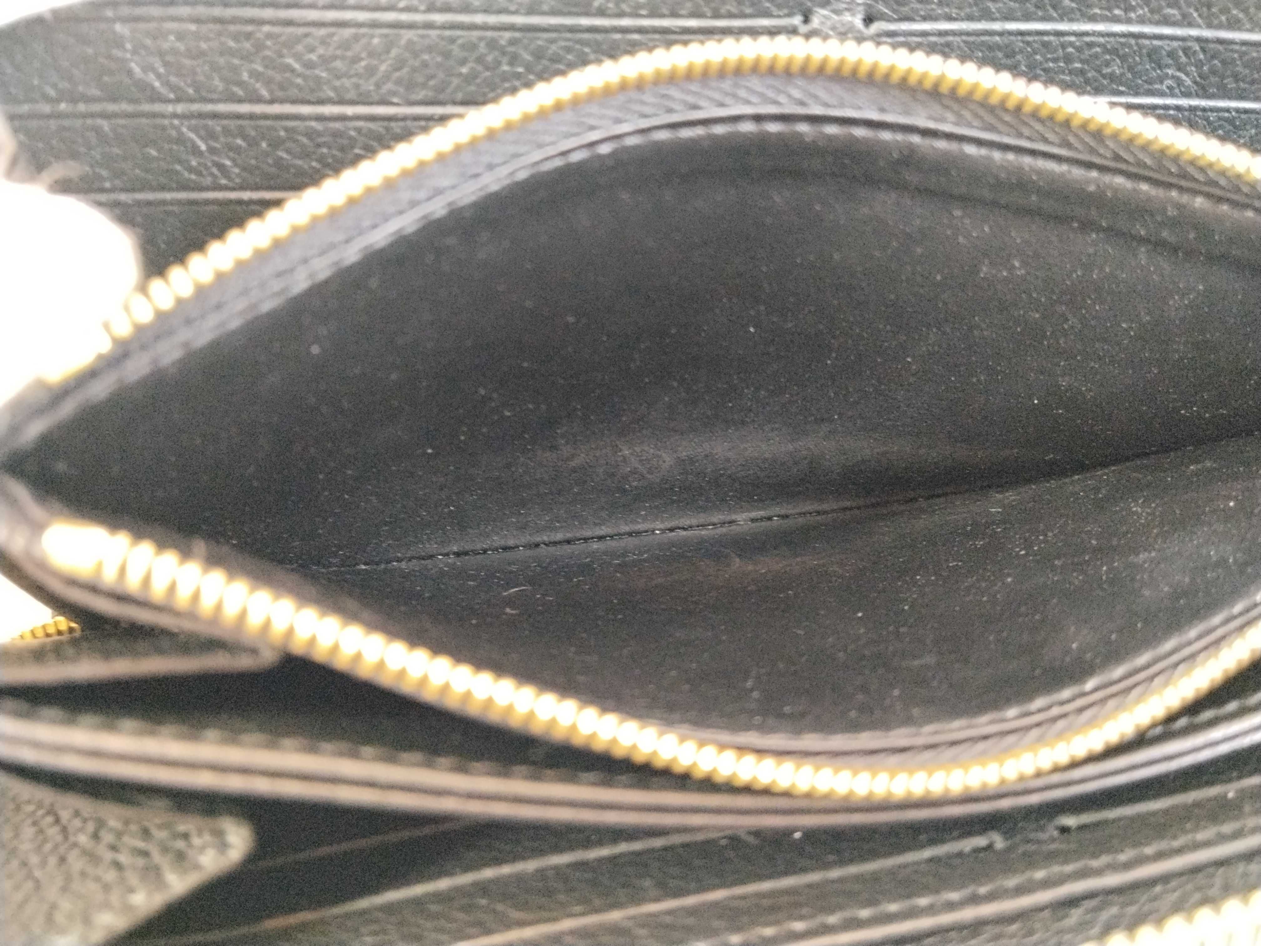 Monogram Black Embossed Leather Zippy Wallet — view 10