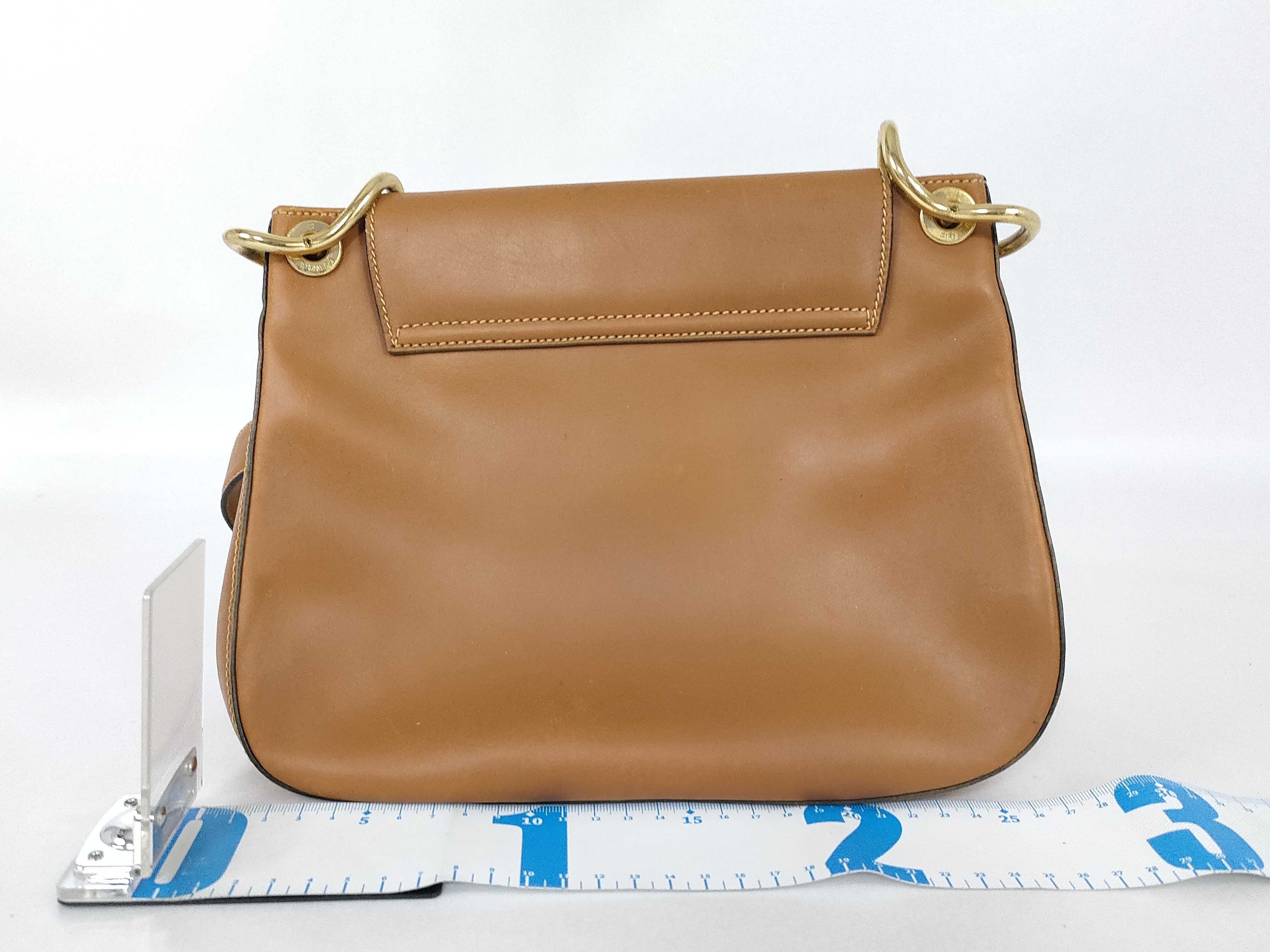 logo embossed leather chain shoulder bag white tag 7 shoulder bag — view 2
