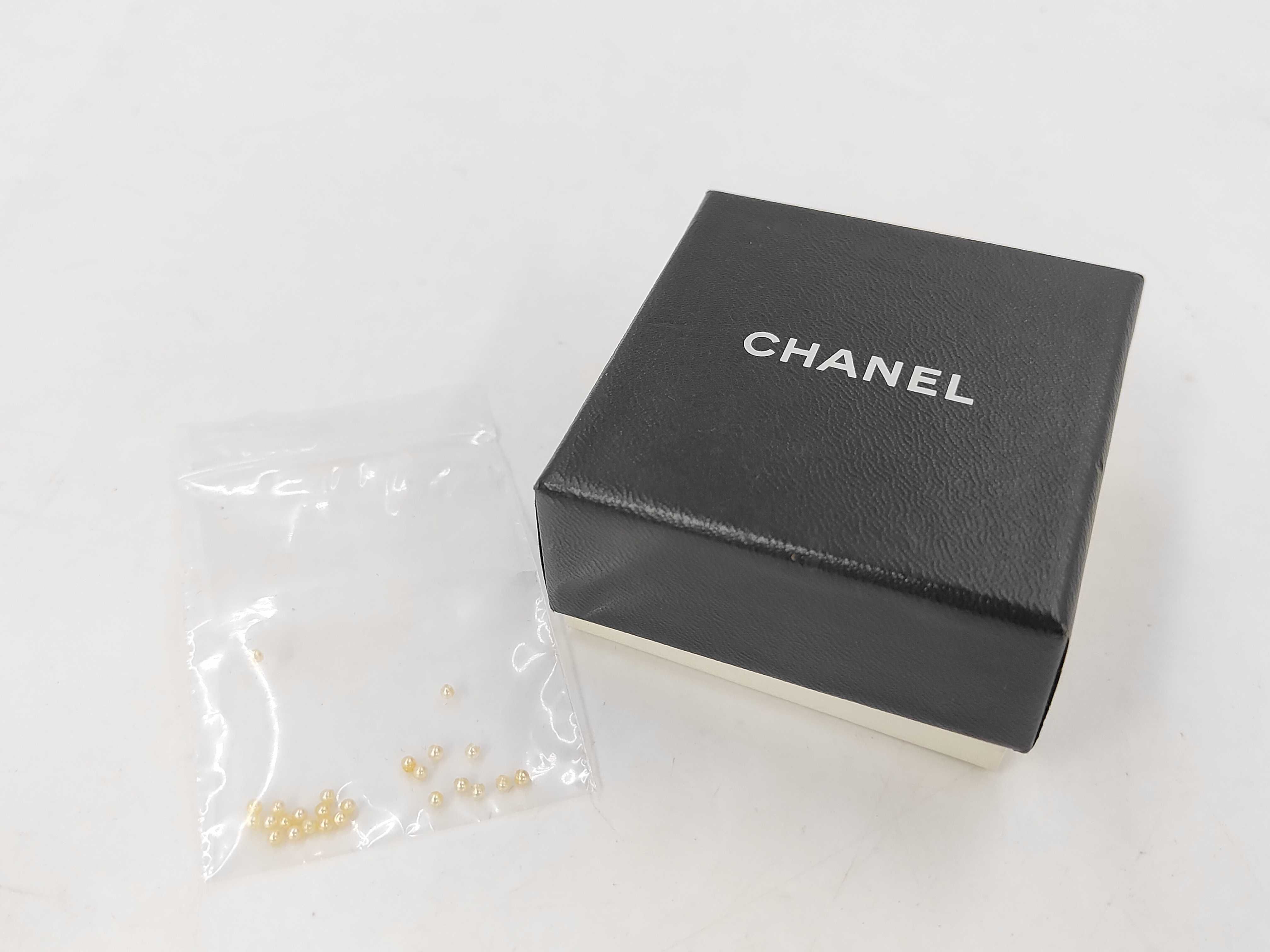 pearl earrings with Coco Mark — view 8