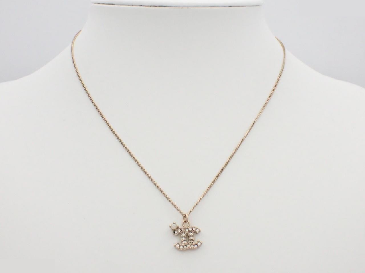 Necklace with Coco Mark design, rhinestones, gold finish, chain approximately 42cm long. — view 3