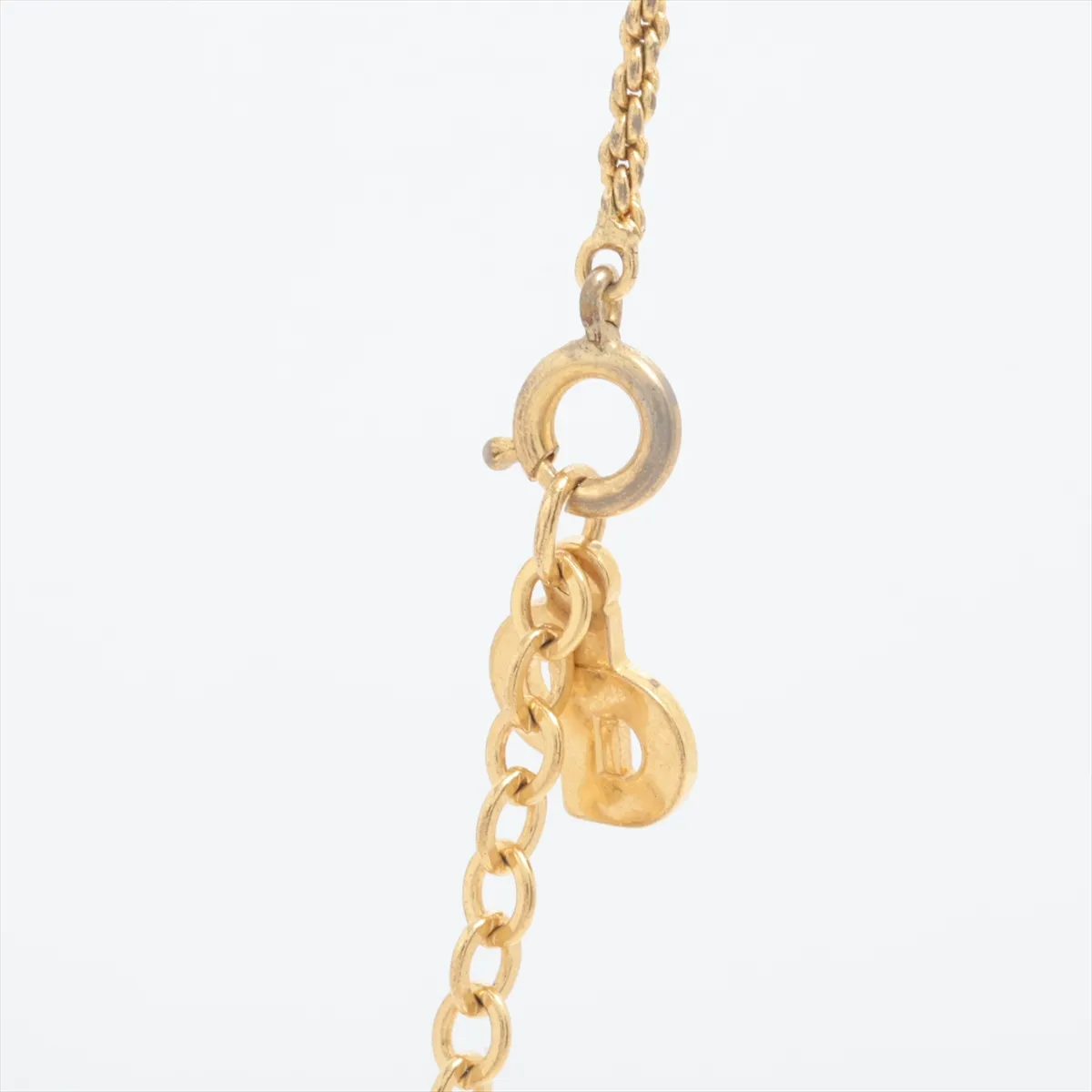 CD logo necklace, gold plated with rhinestones. Shows signs of wear, — view 3