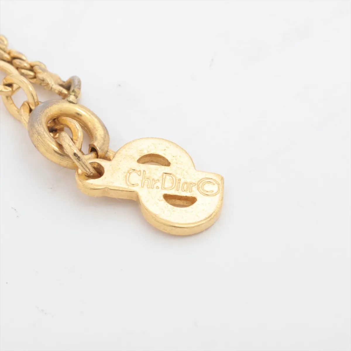 CD logo necklace, gold plated with rhinestones. Shows signs of wear, — view 4