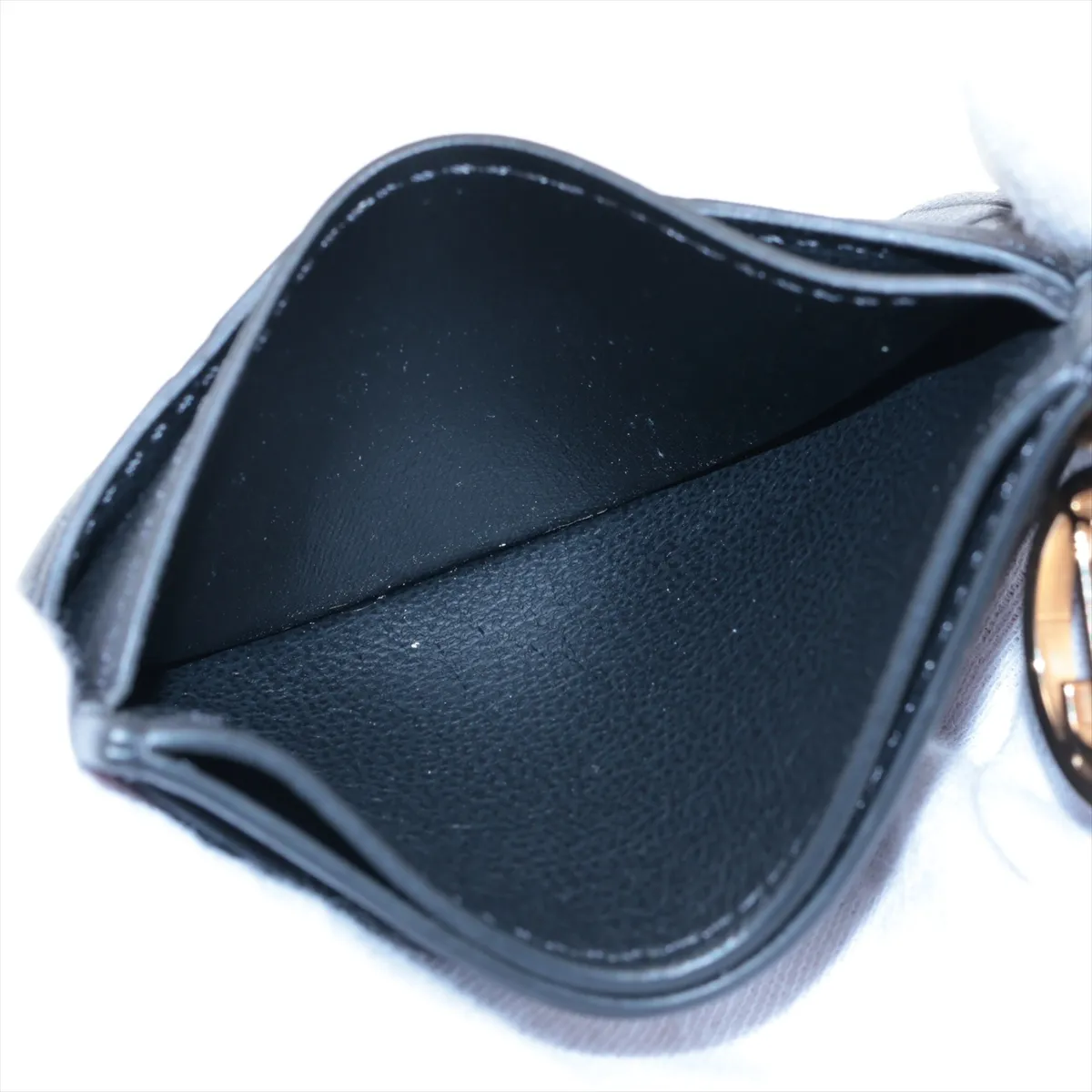 Monogram Embossed Porte Cartes Coussin M82748 Black Card Case (RFID detected) — view 4