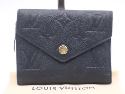 M64060 Empreinte Portefeuille Victorine Noir Wallet with Dust Bag