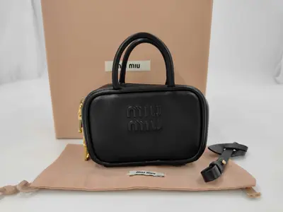 handbag, black leather handbag.