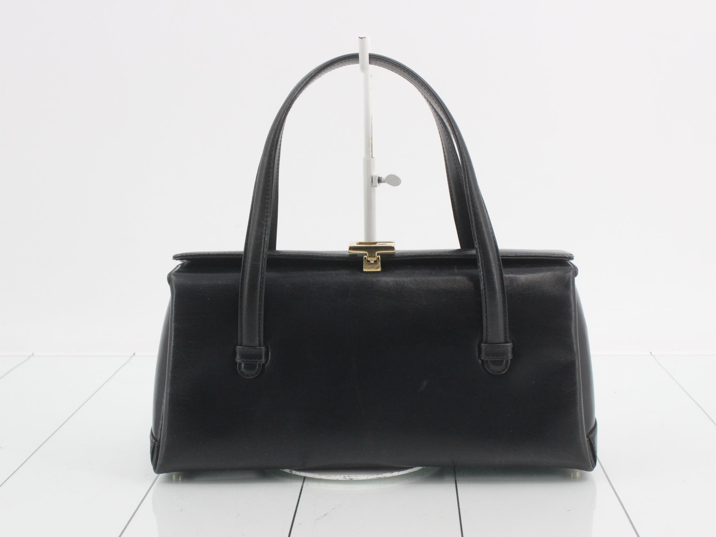 Vintage Gucci leather handbag with G logo