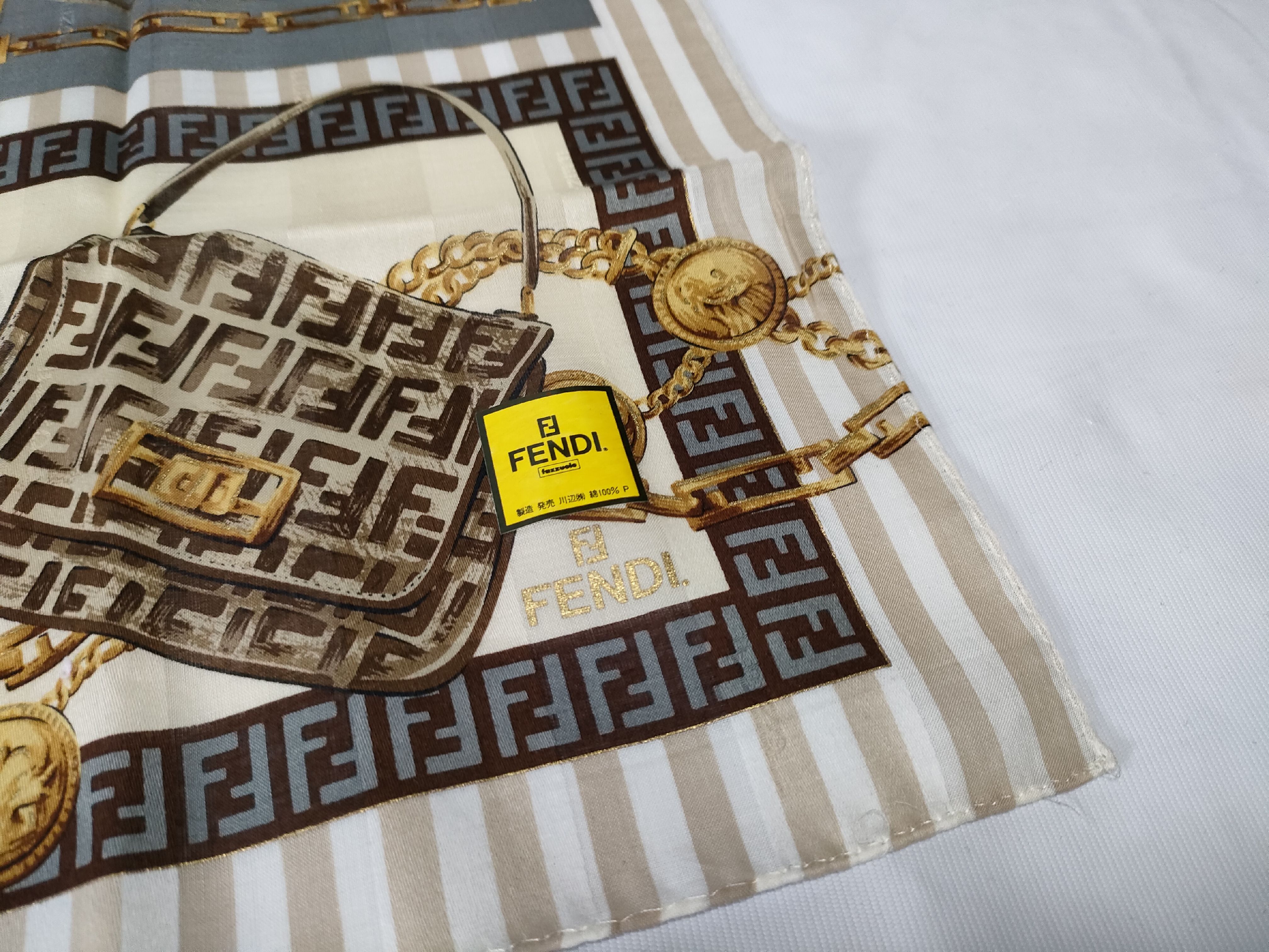 Zucca Zucchino Pecan bag, chain print handkerchief, and other accessories. — view 3