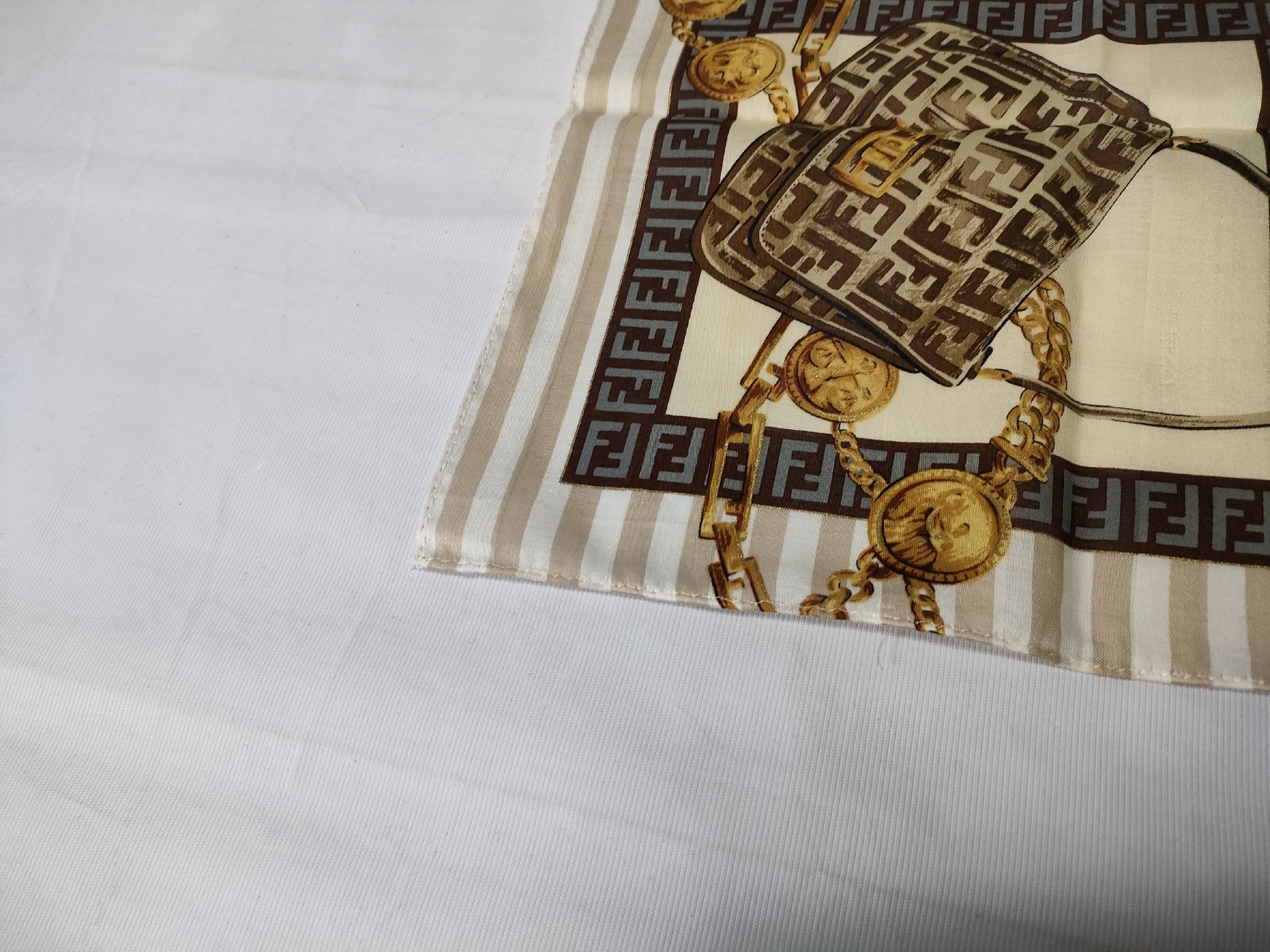 Zucca Zucchino Pecan bag, chain print handkerchief, and other accessories. — view 4