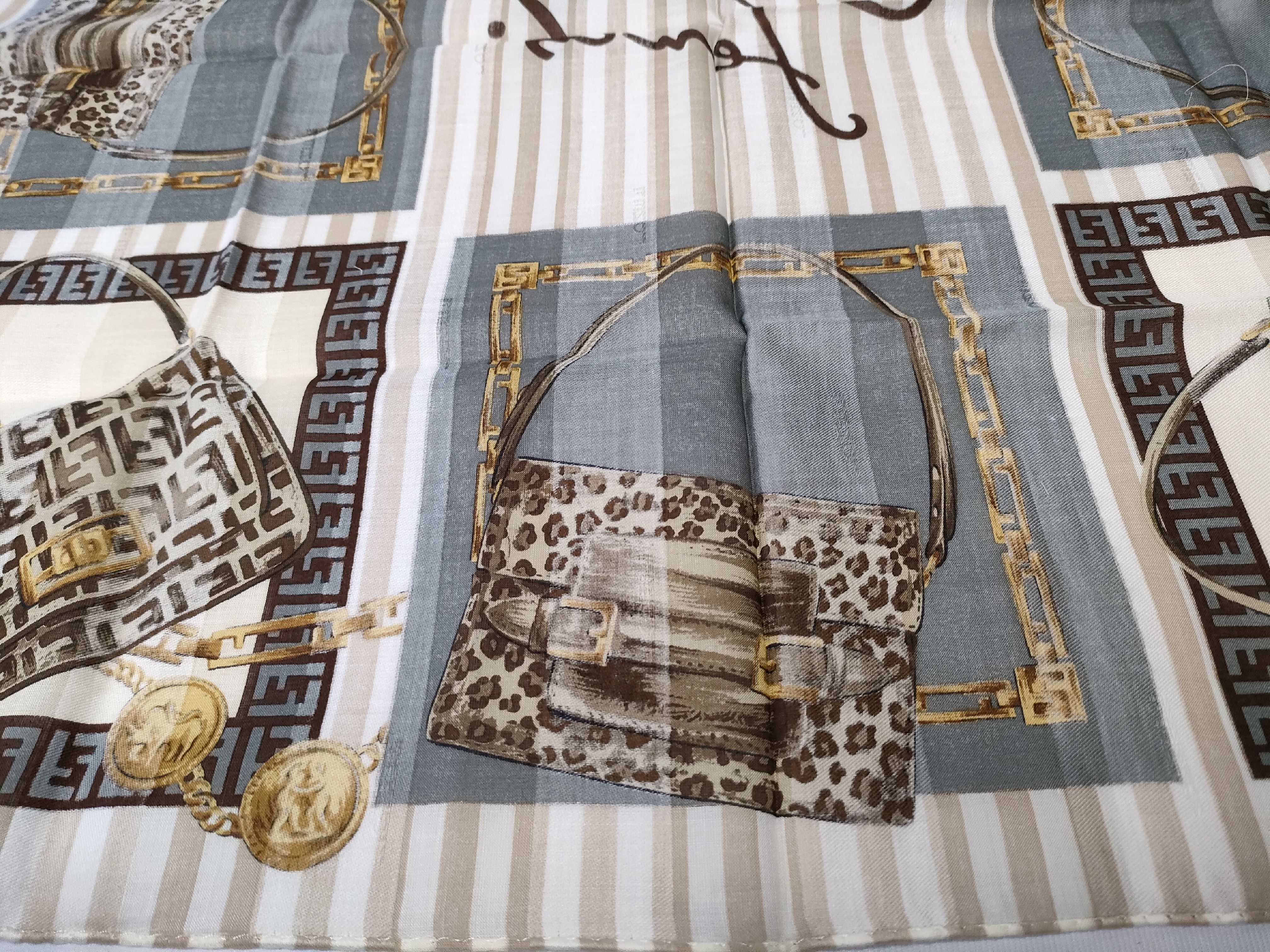 Zucca Zucchino Pecan bag, chain print handkerchief, and other accessories. — view 8