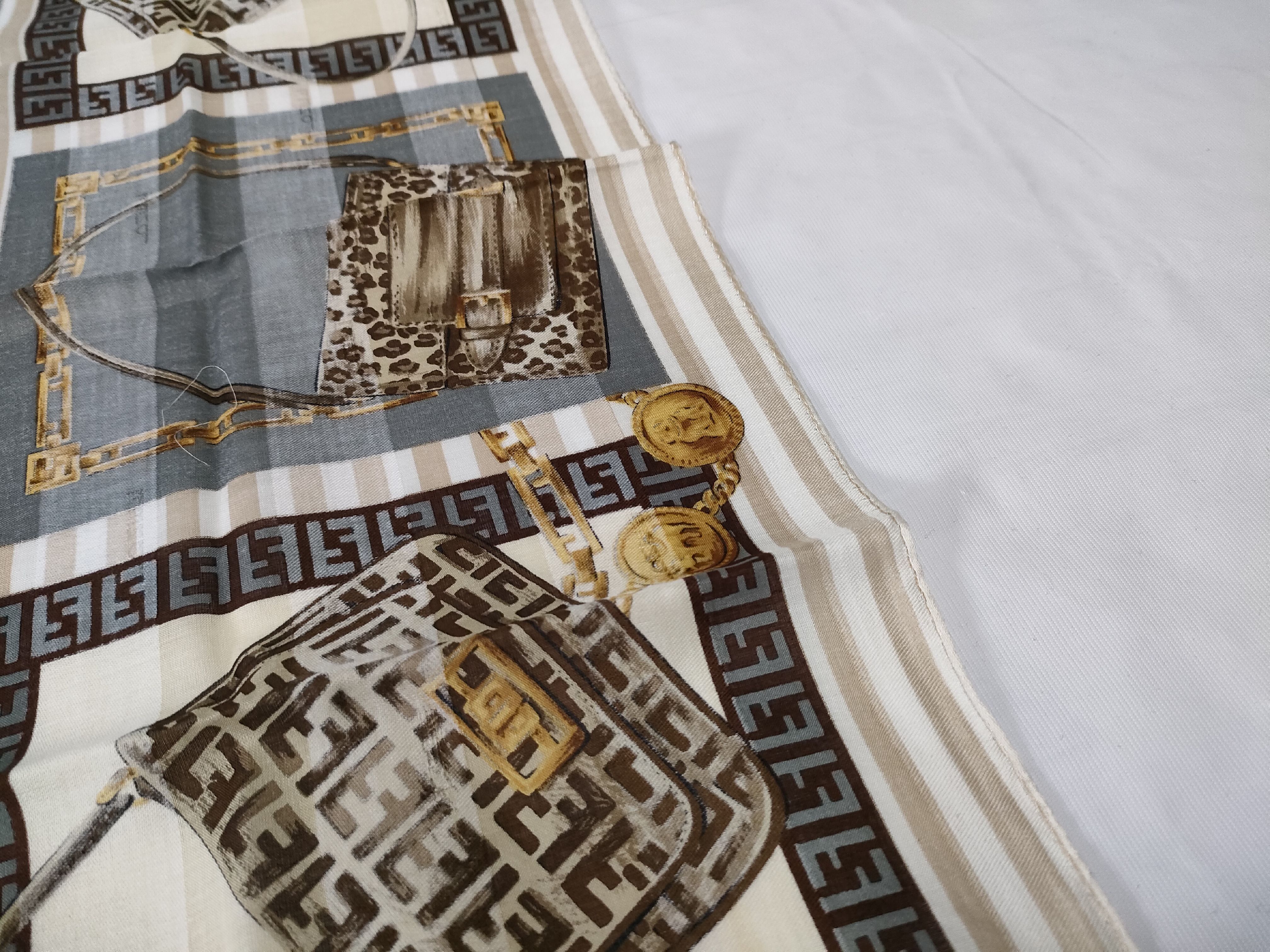 Zucca Zucchino Pecan bag, chain print handkerchief, and other accessories. — view 9