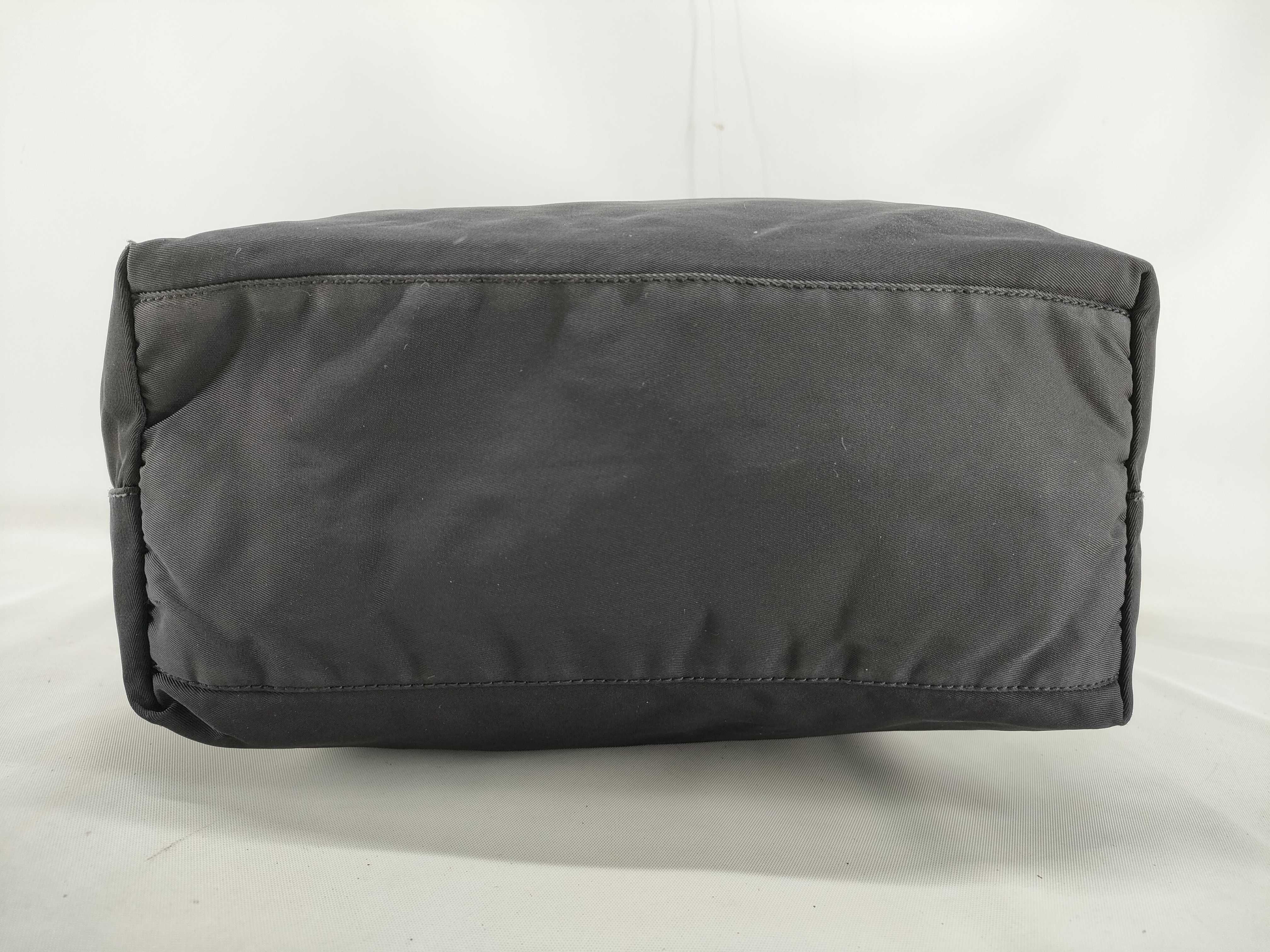nylon tote bag, black, with zipper and white tag, size 25. — view 3