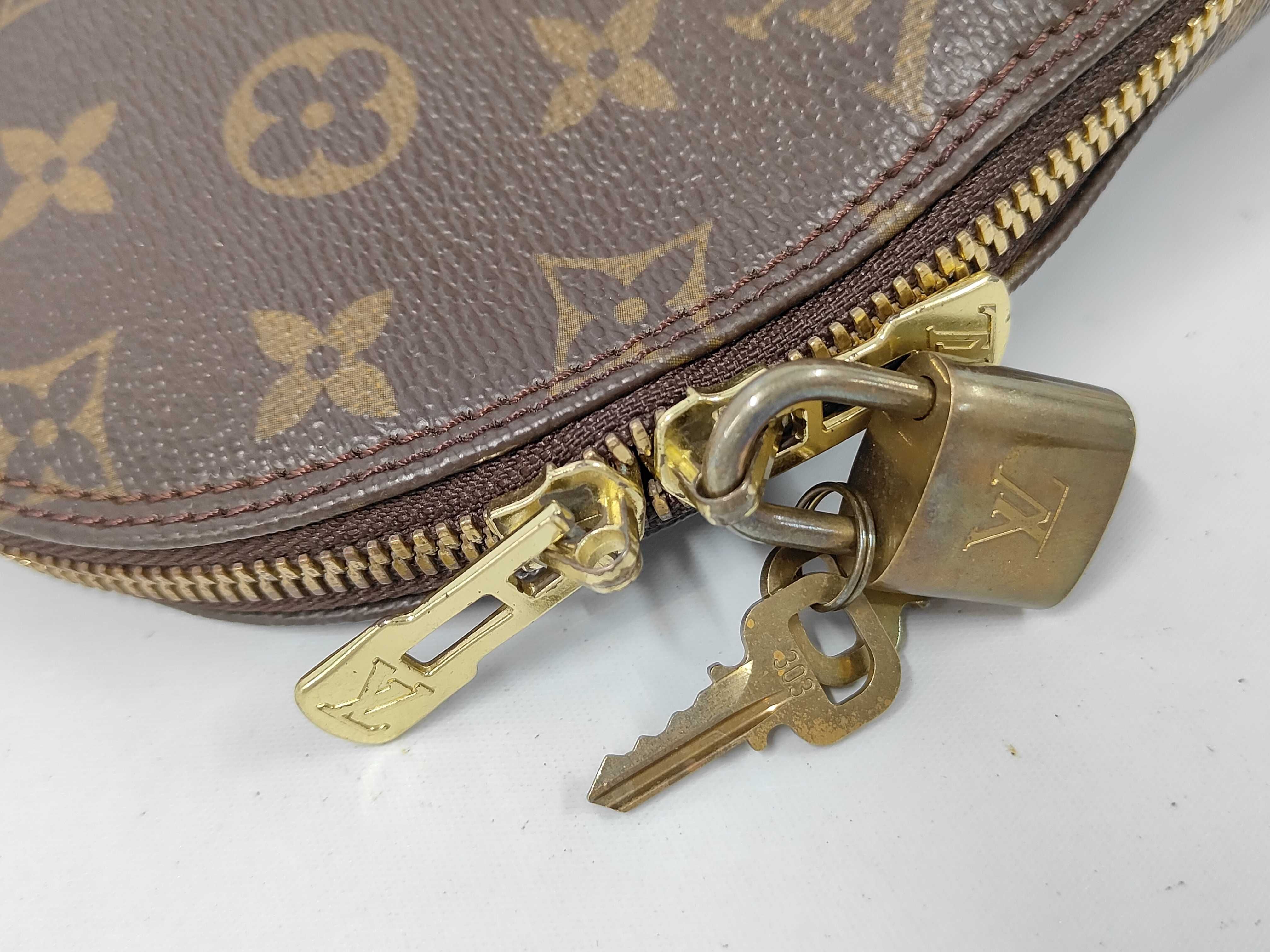 LV Alma handbag — view 8
