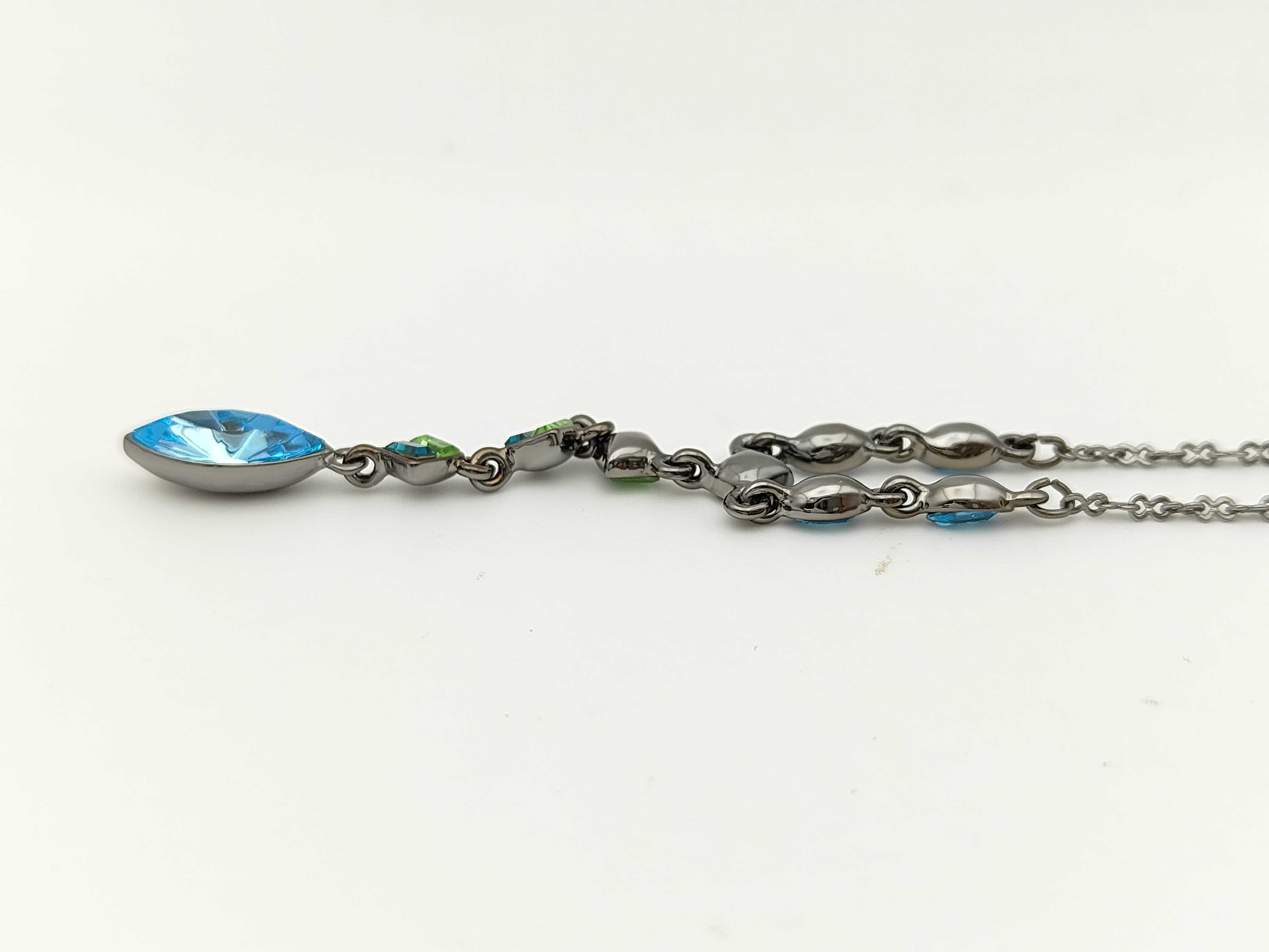 Y-shaped drop necklace with blue and green stones in gunmetal, dark silver, and black silver. — view 3