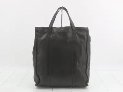 leather tote bag with triangular logo.