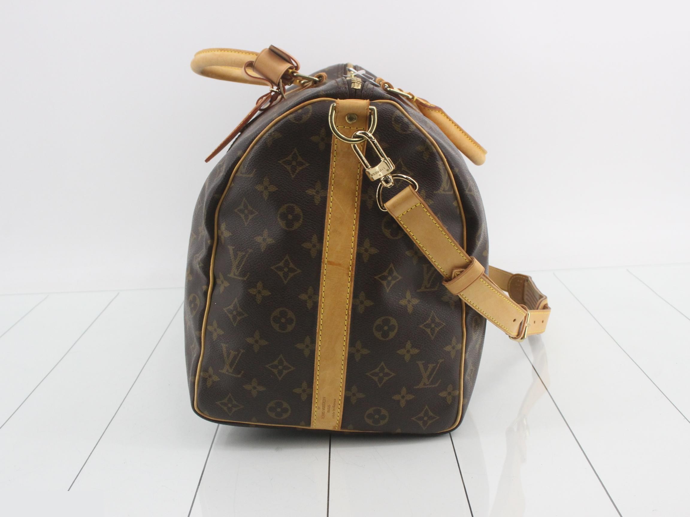 Keepall Bandouliere 50: Shoulder strap, padlock, 2 keys, name tag. — view 4