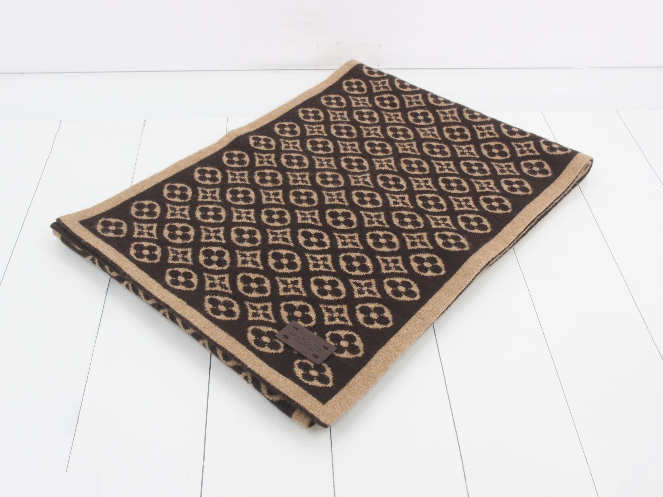 Monogram reversible jacket with tag, brown.