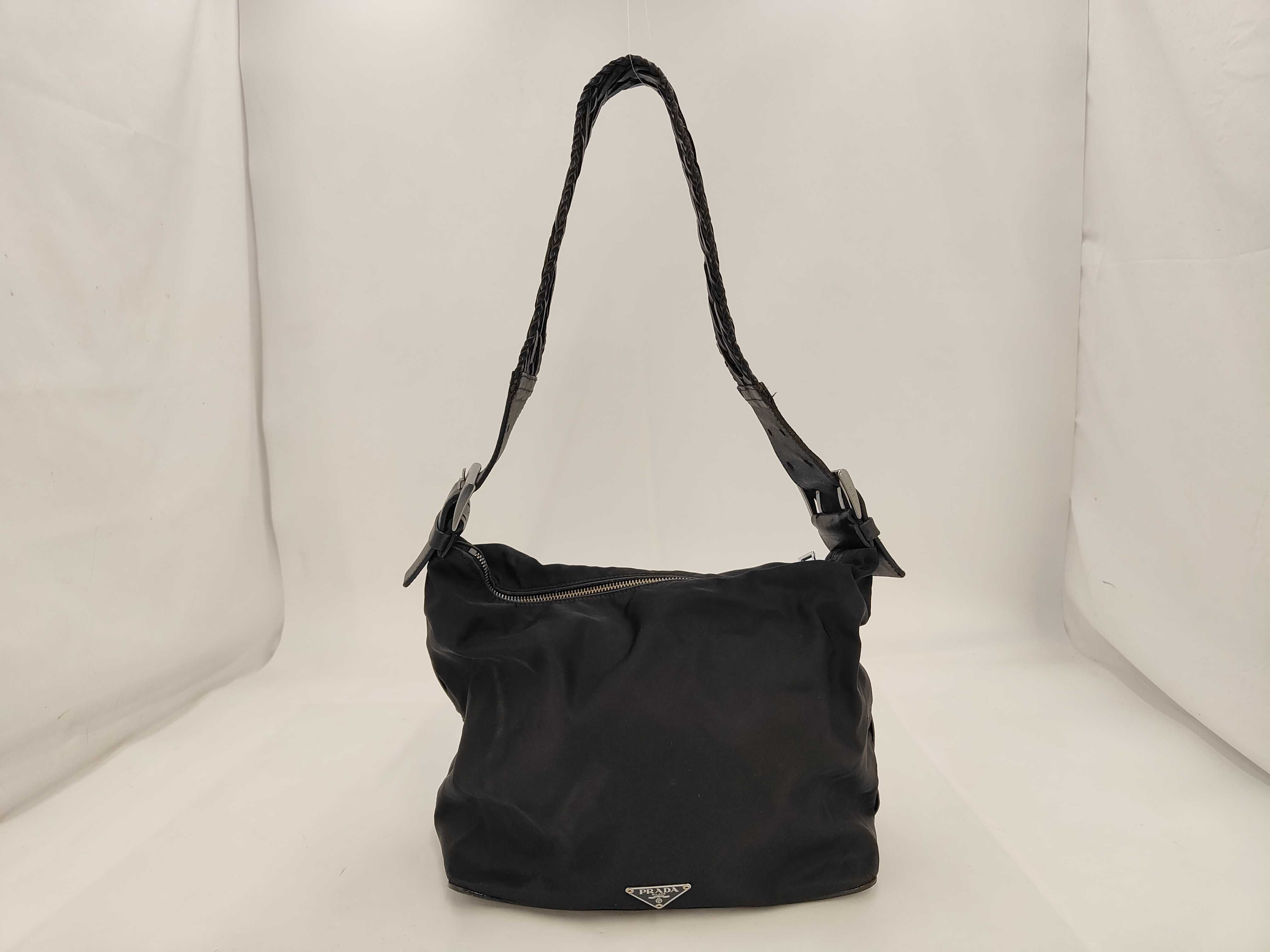braided one-shoulder bag with triangular logo