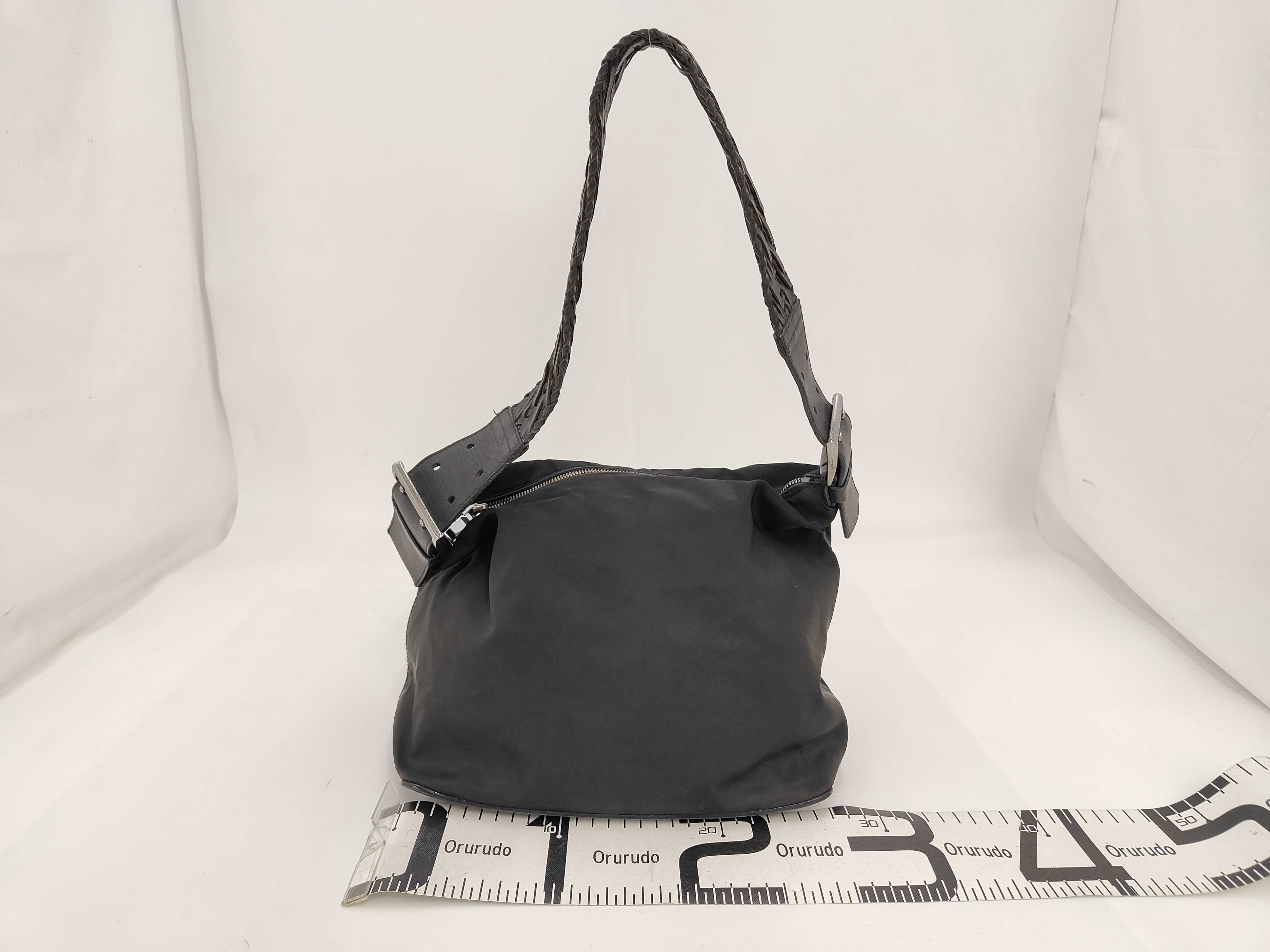 braided one-shoulder bag with triangular logo — view 2