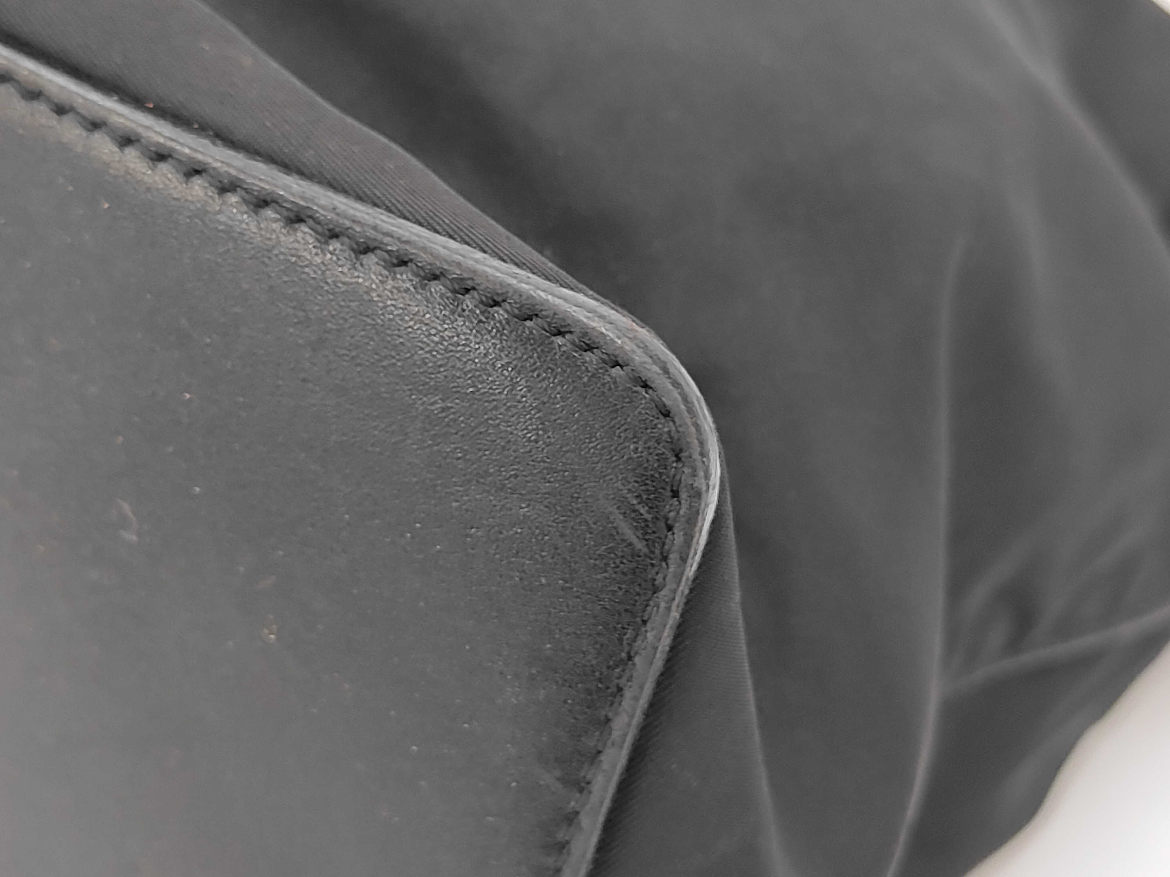 braided one-shoulder bag with triangular logo — view 3