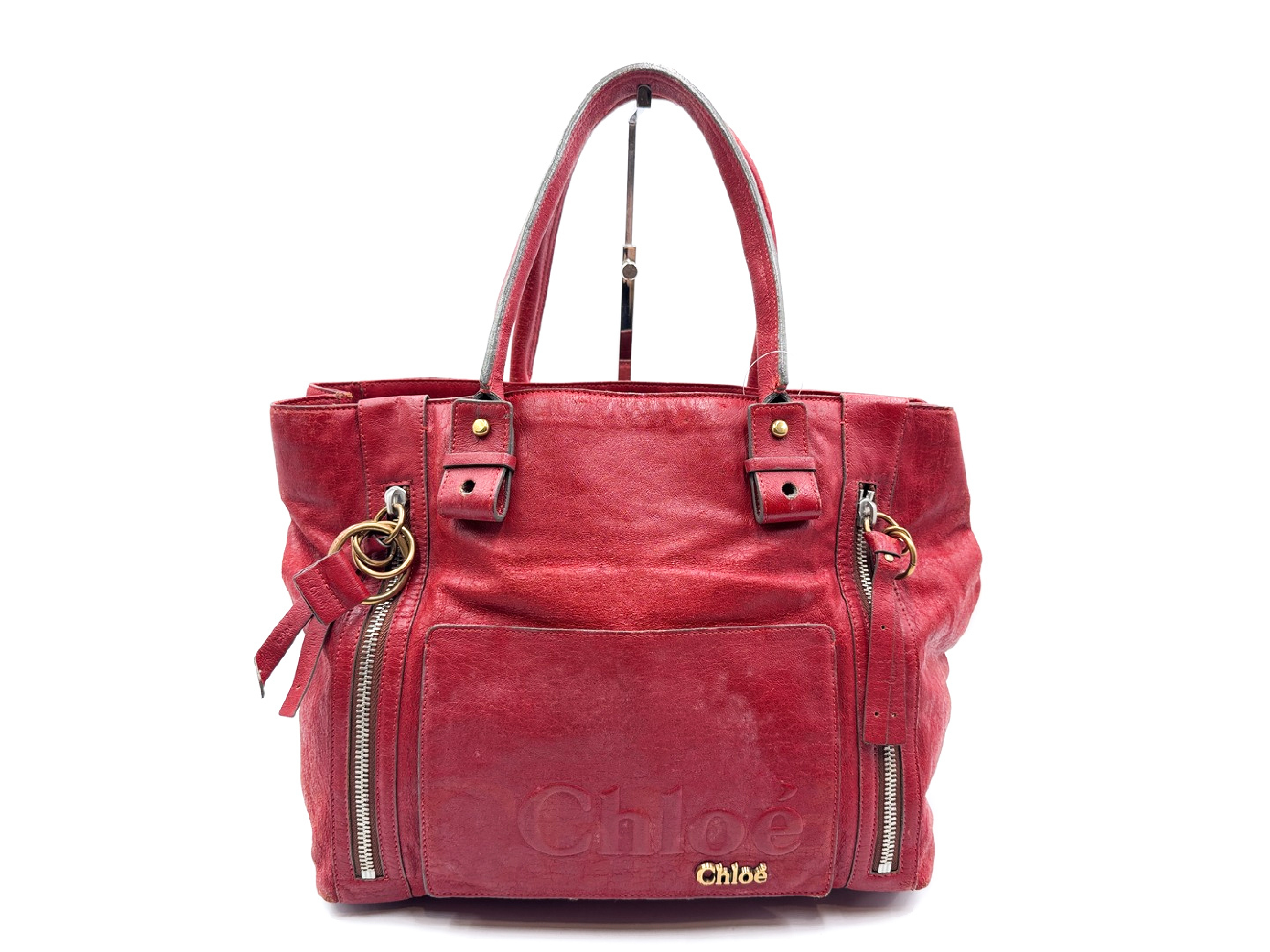 leather tote bag with gold hardware, red.