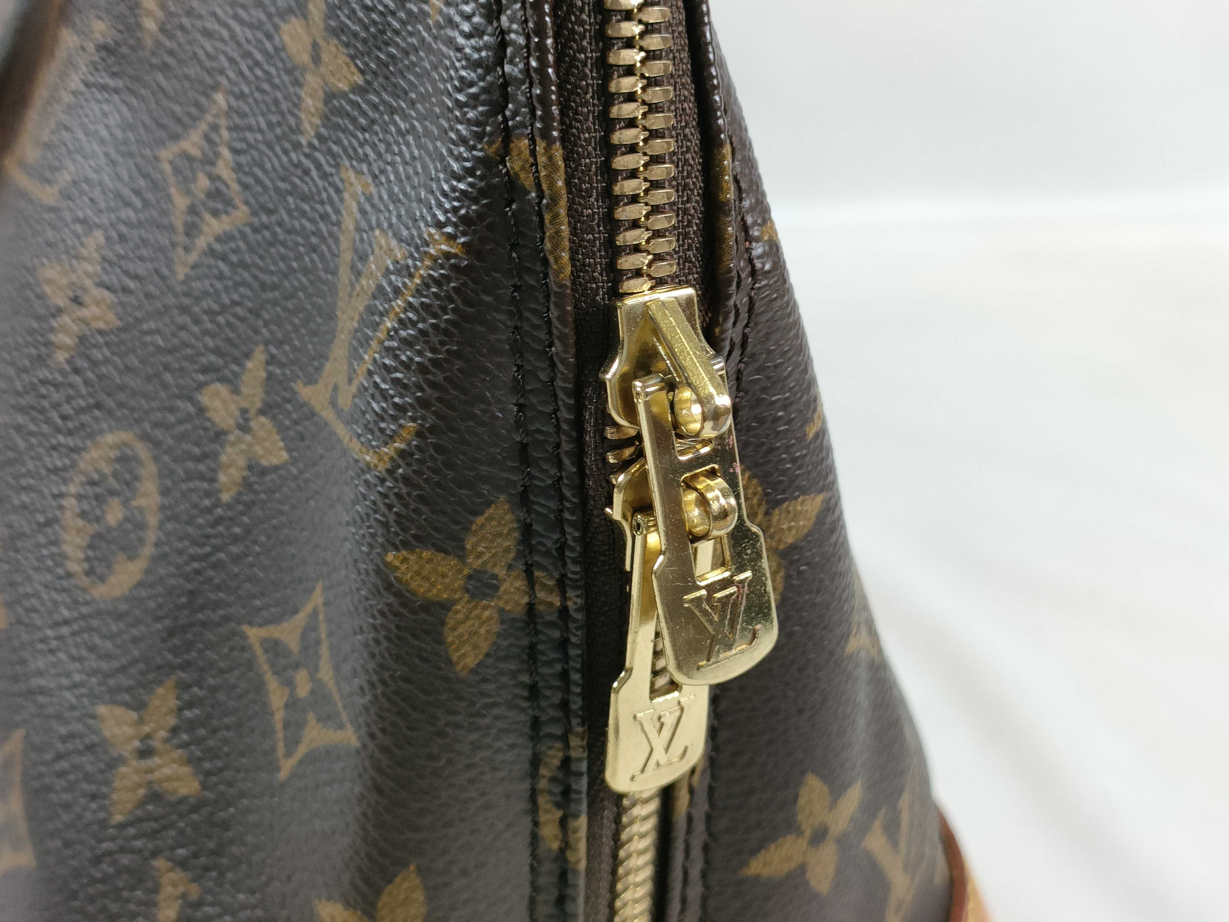 Monogram Alma M51130 VI0947 Brown Handbag — view 8