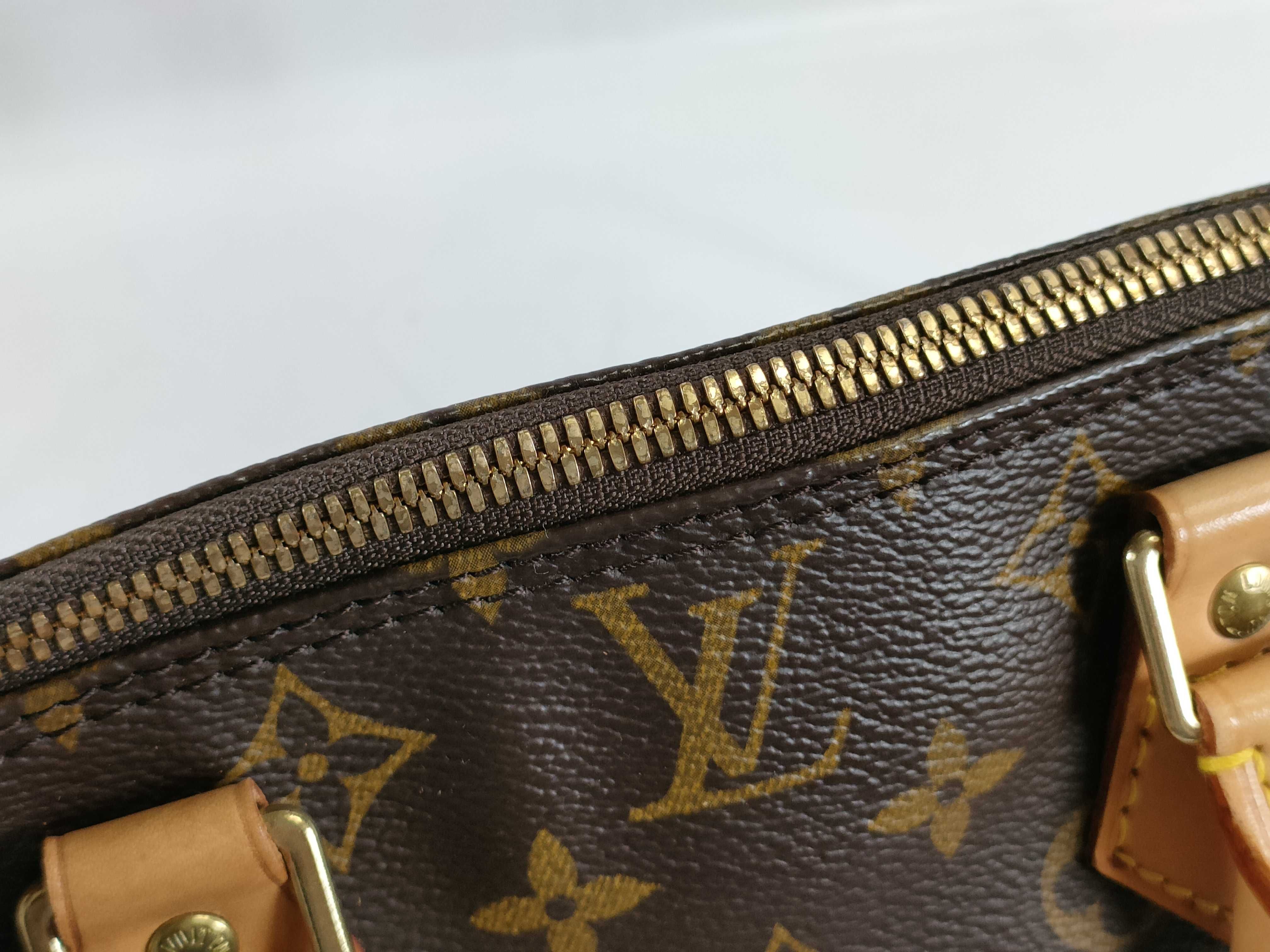 Monogram Alma M51130 VI0947 Brown Handbag — view 9