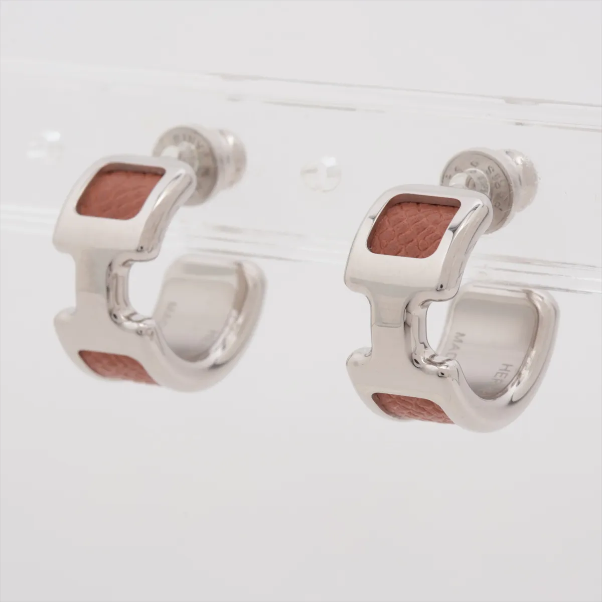 Olympe PM hoop earrings, gold-plated leather, silver and brown finish. Shows signs of wear including