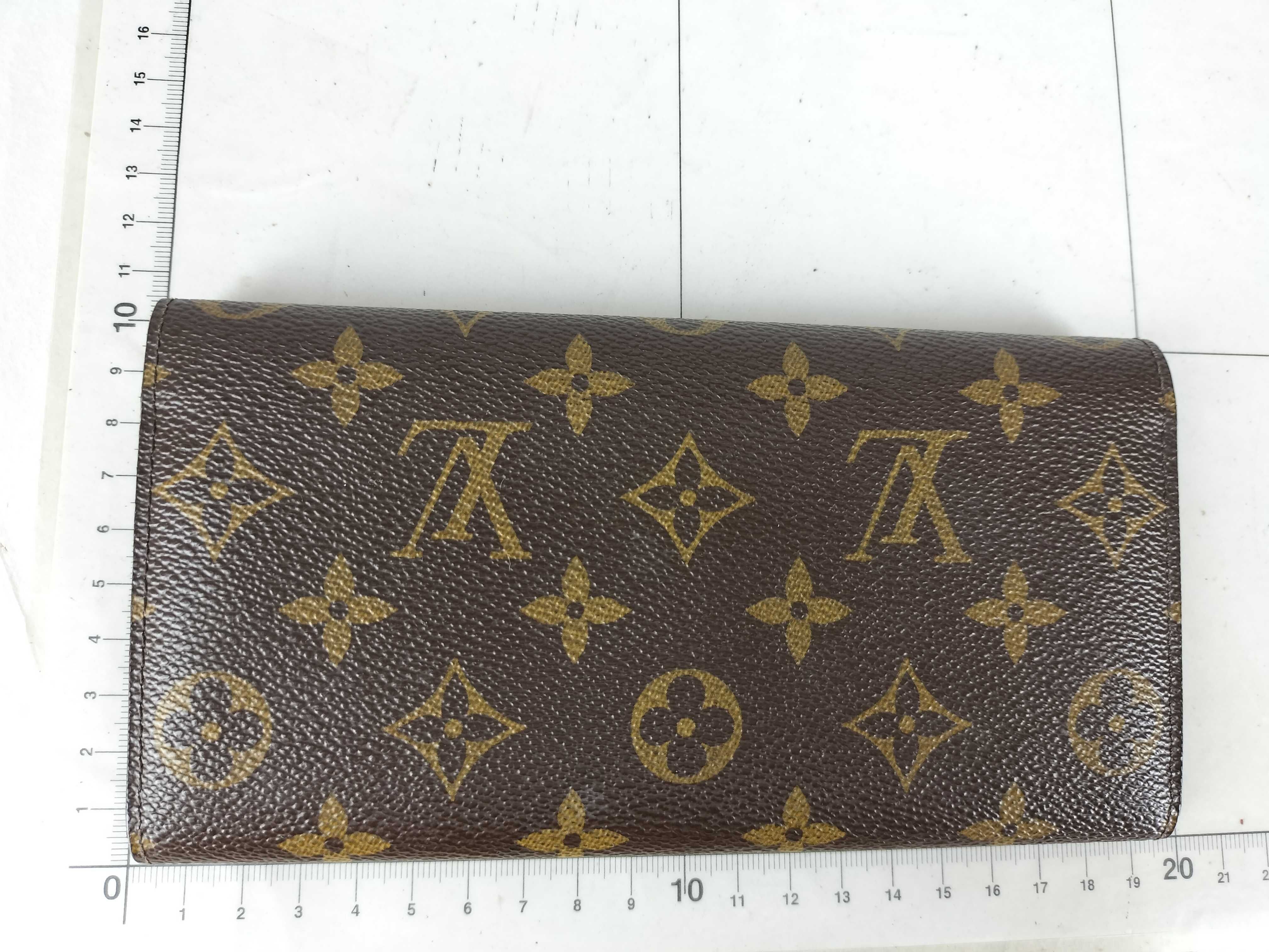 Monogram Louis Vuitton Portefeuille Emilie wallet, scuffs, wear and tear. — view 2