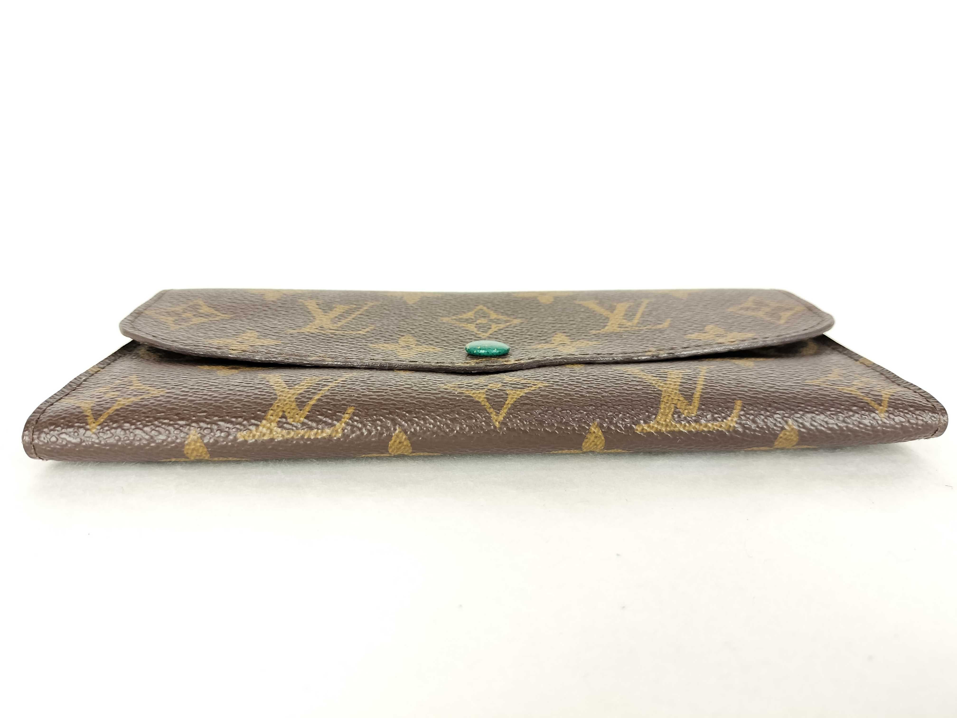 Monogram Louis Vuitton Portefeuille Emilie wallet, scuffs, wear and tear. — view 3