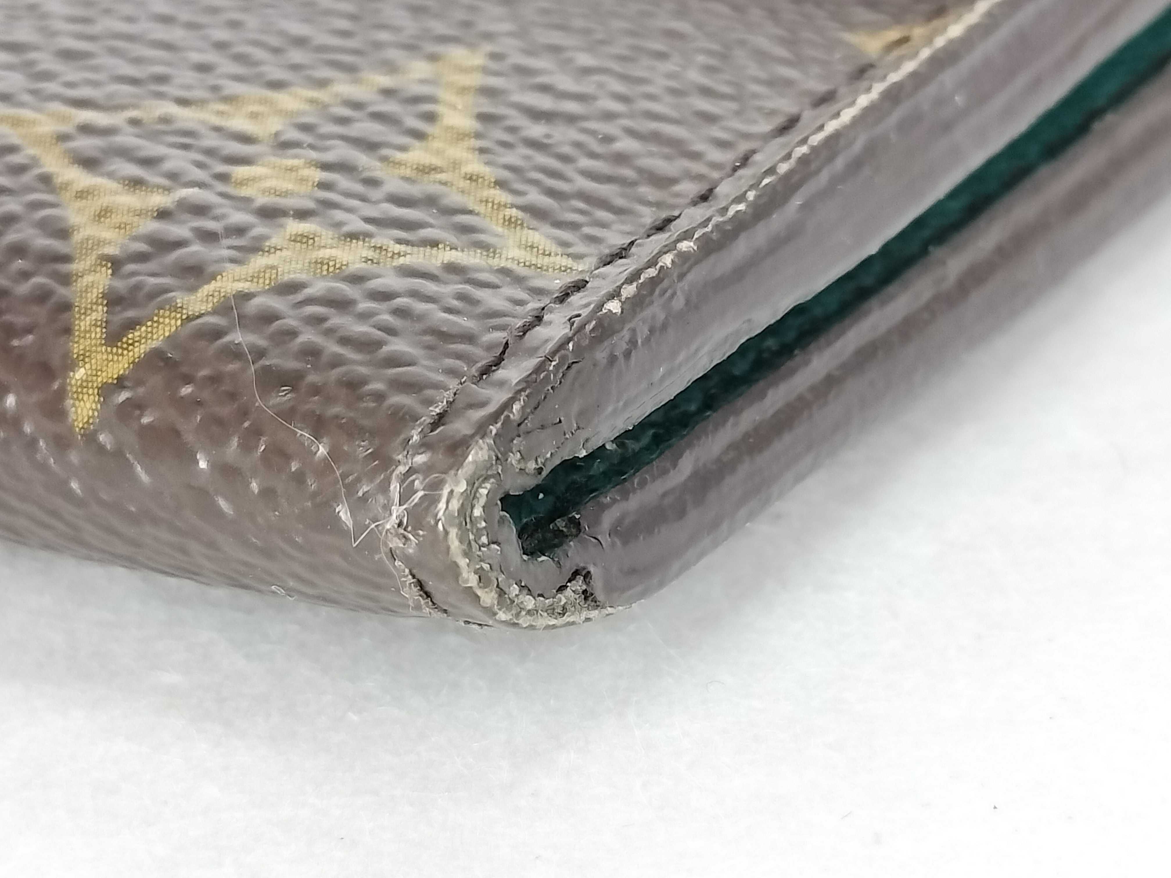 Monogram Louis Vuitton Portefeuille Emilie wallet, scuffs, wear and tear. — view 4