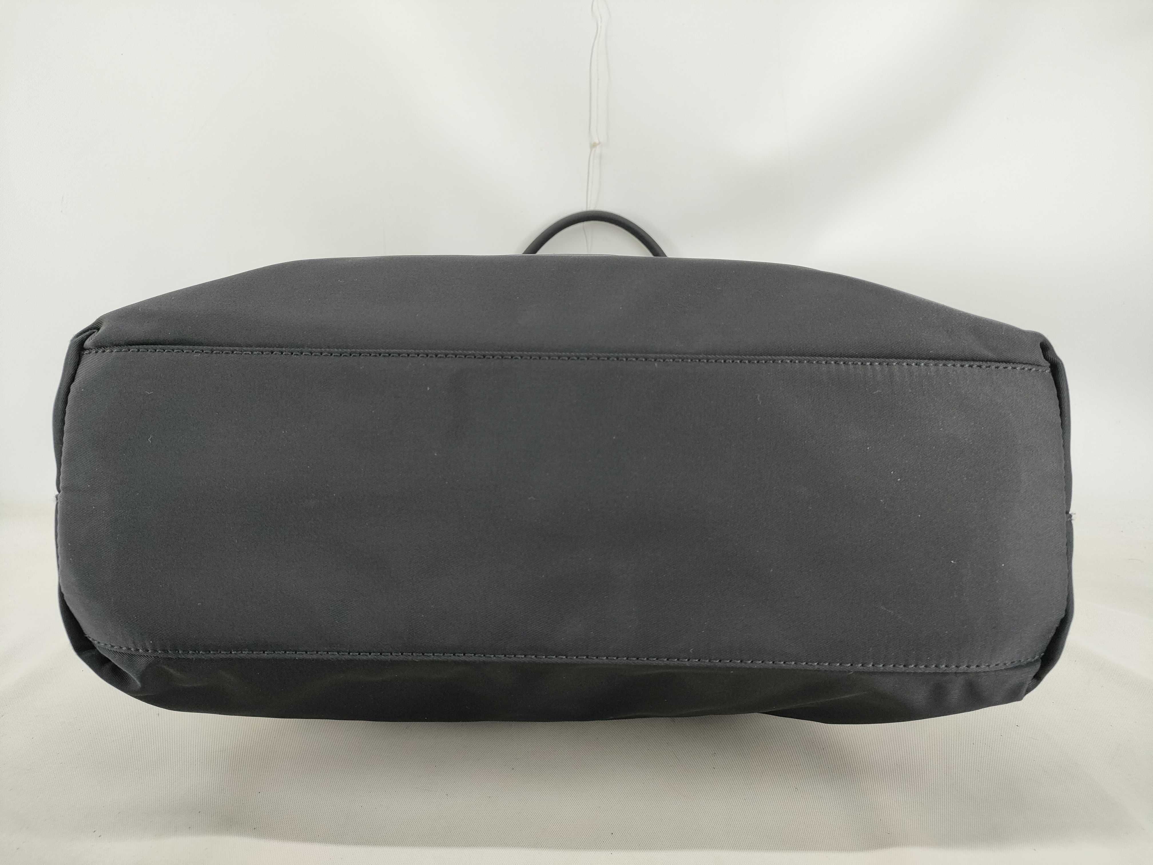 nylon tote bag, black, with zipper and white tag, size 58. — view 3
