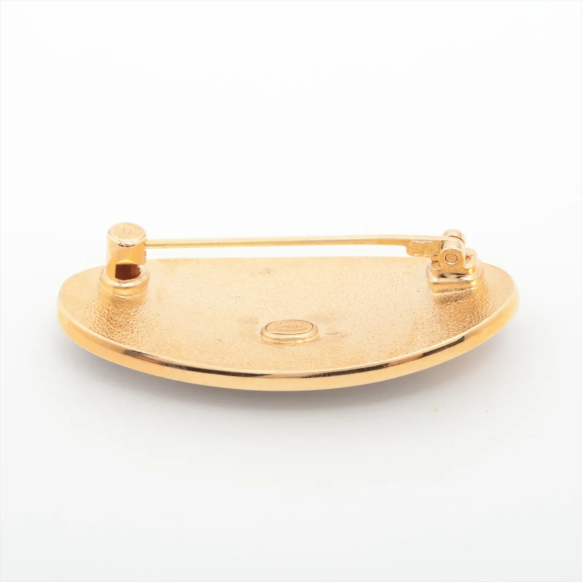 logo C24C brooch, GP black x gold. Shows signs of wear including — view 2