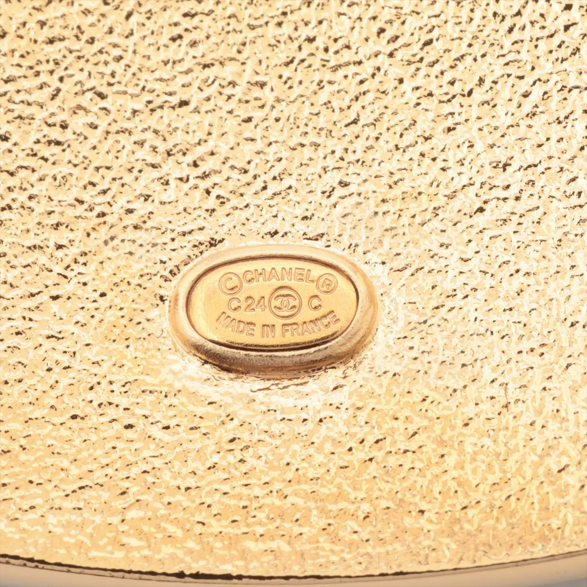 logo C24C brooch, GP black x gold. Shows signs of wear including — view 4